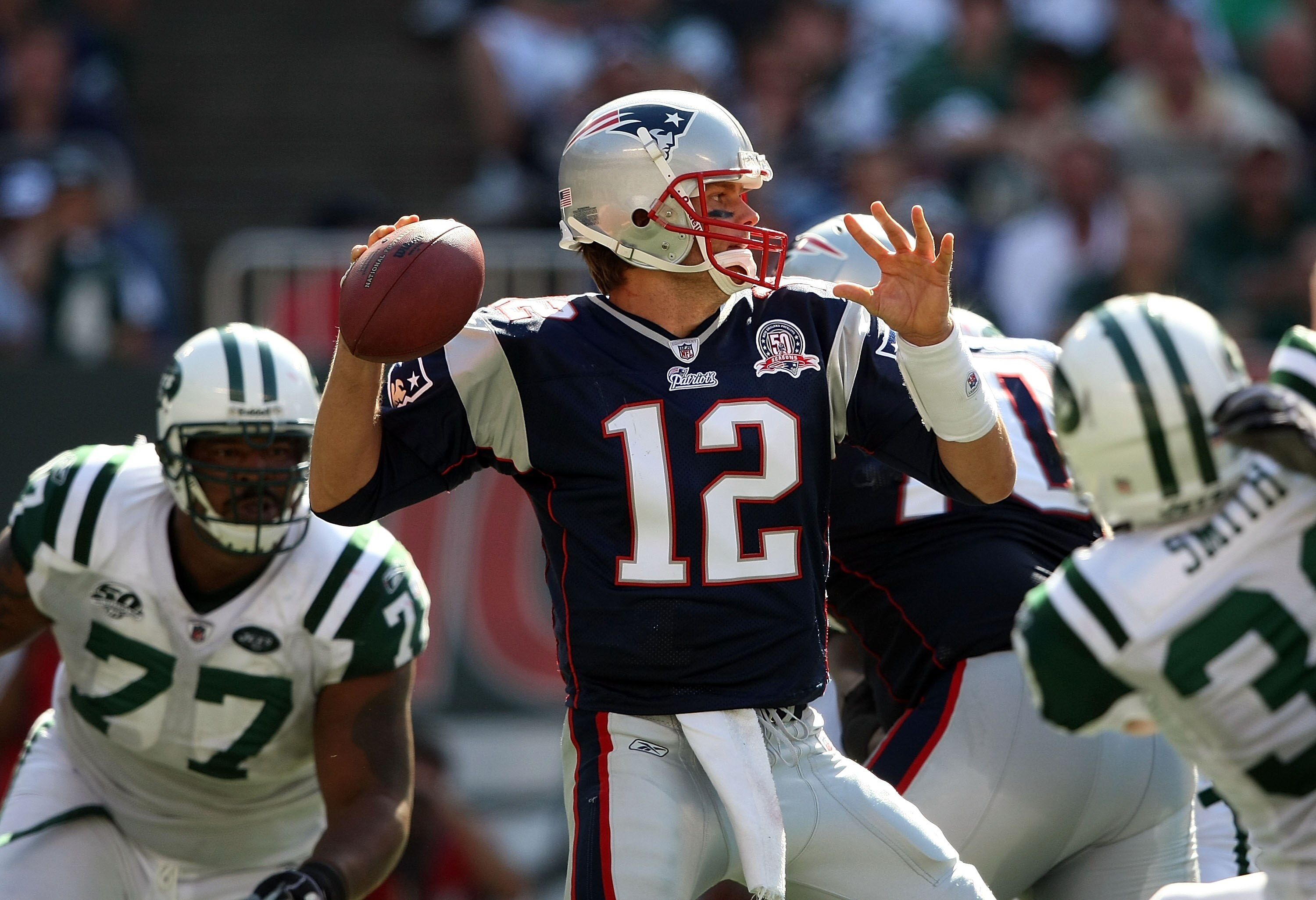 EAST RUTHERFORD, NJ - SEPTEMBER 20: Tom Brady #12 of the New England Patriots throws a pass against the New York Jets at Giants Stadium on September 20, 2009 in East Rutherford, New Jersey. (Photo by Nick Laham/Getty Images) EAST RUTHERFORD, NJ - SEPTEMBER 20: Tom Brady #12 of the New England Patriots throws a pass against the New York Jets at Giants Stadium on September 20, 2009 in East Rutherford, New Jersey. (Photo by Nick Laham/Getty Images)