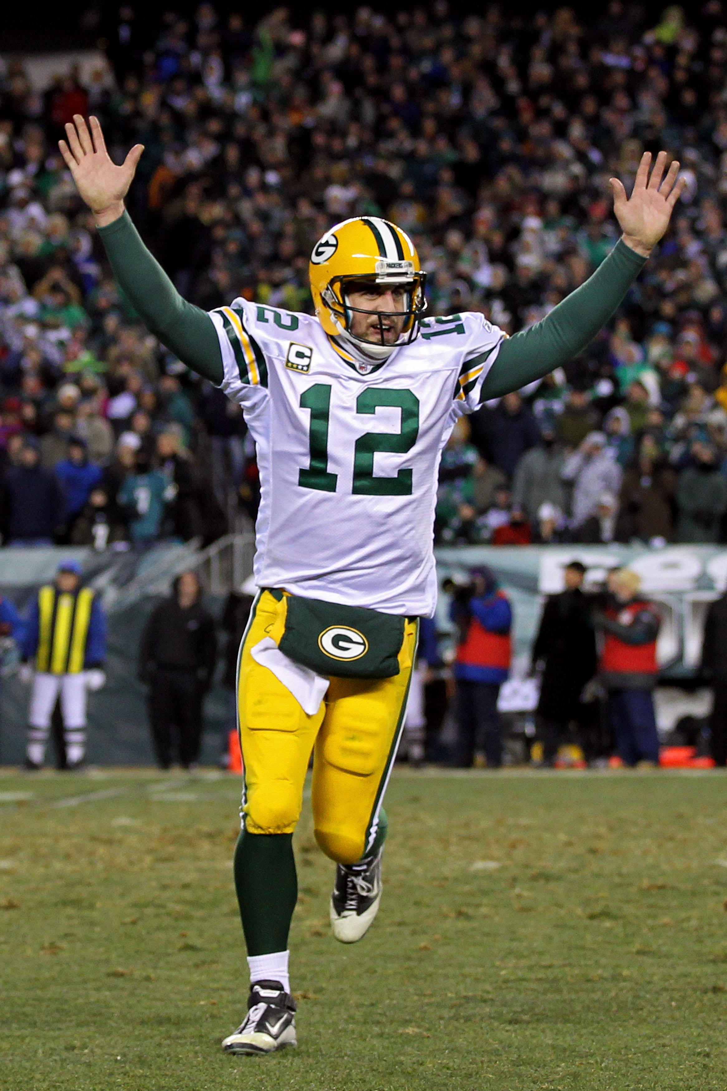 PHILADELPHIA, PA - JANUARY 09: Aaron Rodgers #12 of the Green Bay Packers celebrates after a touchdown in the third quarter against the Philadelphia Eagles during the 2011 NFC wild card playoff game at Lincoln Financial Field on January 9, 2011 in Philad PHILADELPHIA, PA - JANUARY 09: Aaron Rodgers #12 of the Green Bay Packers celebrates after a touchdown in the third quarter against the Philadelphia Eagles during the 2011 NFC wild card playoff game at Lincoln Financial Field on January 9, 2011 in Philad