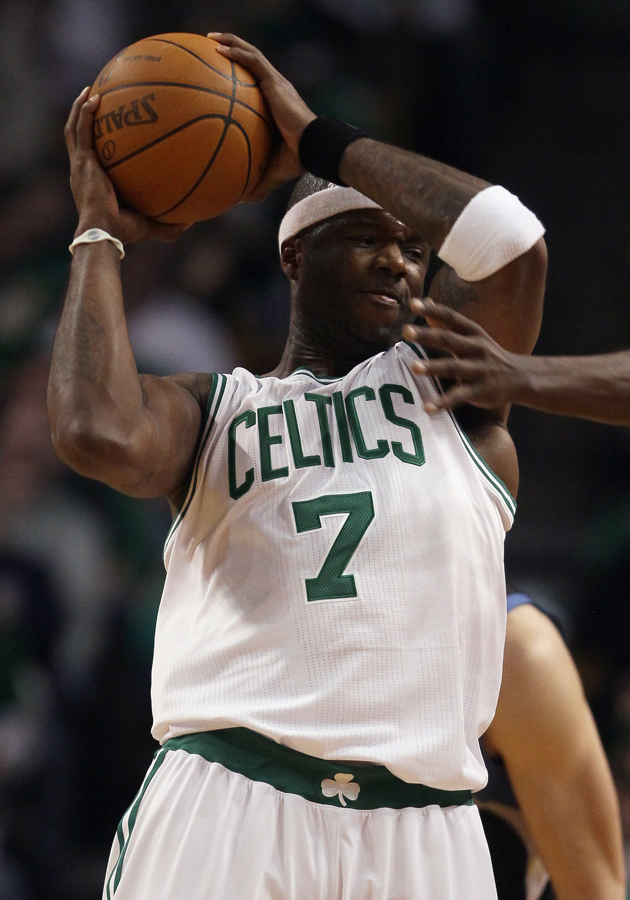 BOSTON, MA - JANUARY 03:  Jermaine O'Neal #7 of the Boston Celtics tries to keep the ball as he is swatted by a memeber of the Minnesota Timberwolves on January 3, 2011 at the TD Garden in Boston, Massachusetts. The Celtics defeated the Timberwolves 96-93