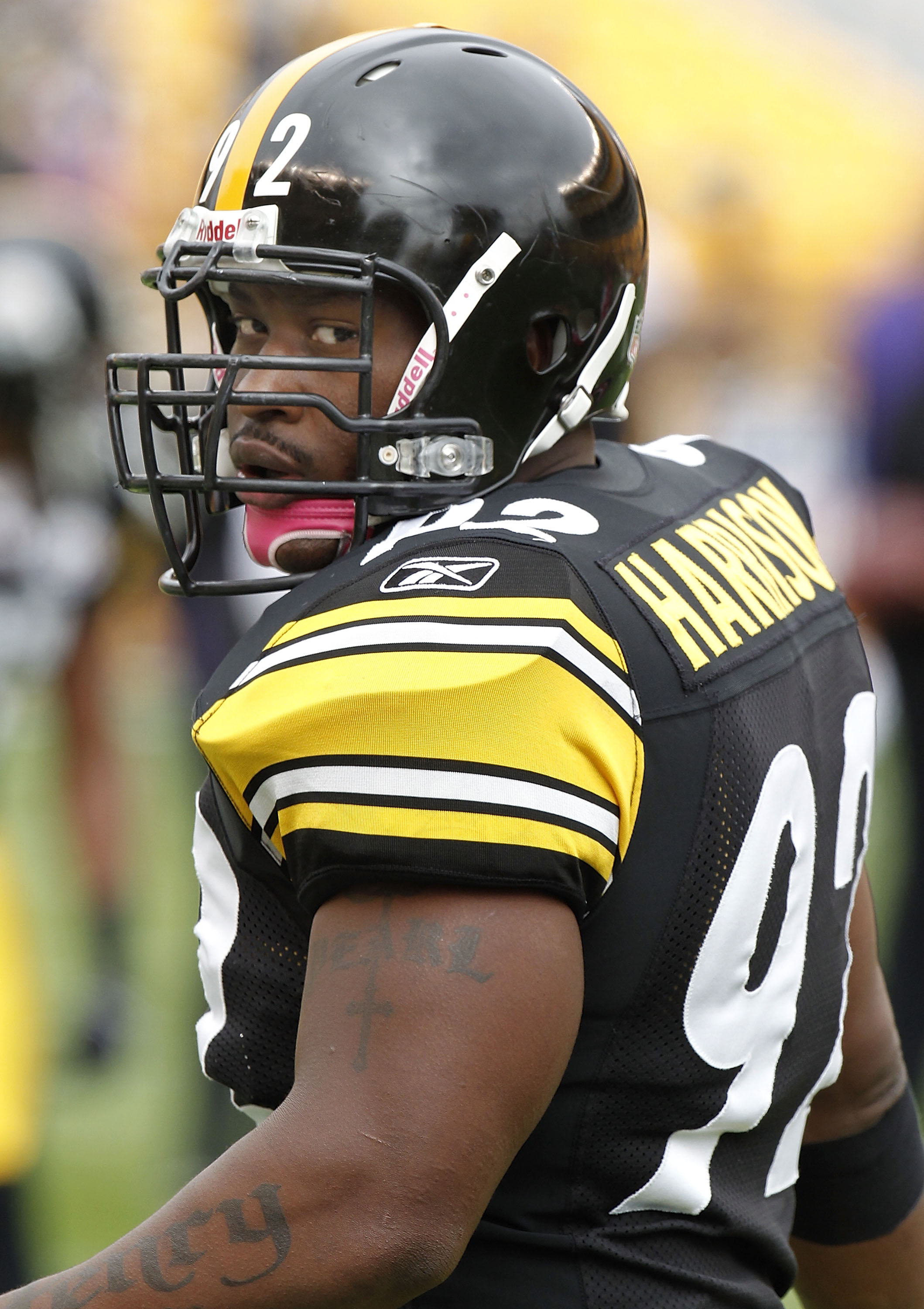 PITTSBURGH - OCTOBER 03: James Harrison #92 of the Pittsburgh Steelers wears a pink chin strap for breast cancer awareness prior to playing the Baltimore Ravens on October 3, 2010 at Heinz Field in Pittsburgh, Pennsylvania. (Photo by Gregory Shamus/Gett PITTSBURGH - OCTOBER 03: James Harrison #92 of the Pittsburgh Steelers wears a pink chin strap for breast cancer awareness prior to playing the Baltimore Ravens on October 3, 2010 at Heinz Field in Pittsburgh, Pennsylvania. (Photo by Gregory Shamus/Gett