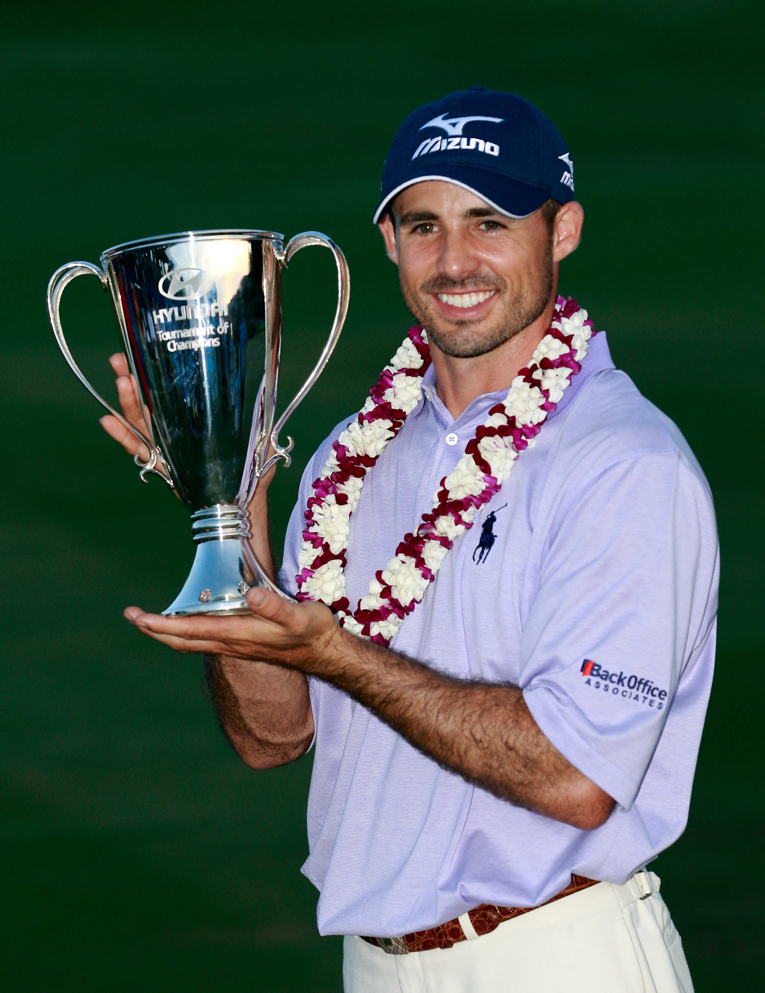 KAPALUA, HI - JANUARY 09:  Jonathan Byrd poses with the trophy after winning the Hyundai Tournament of Champions at the Plantation course on January 9, 2011 in Kapalua, Hawaii.  (Photo by Sam Greenwood/Getty Images)