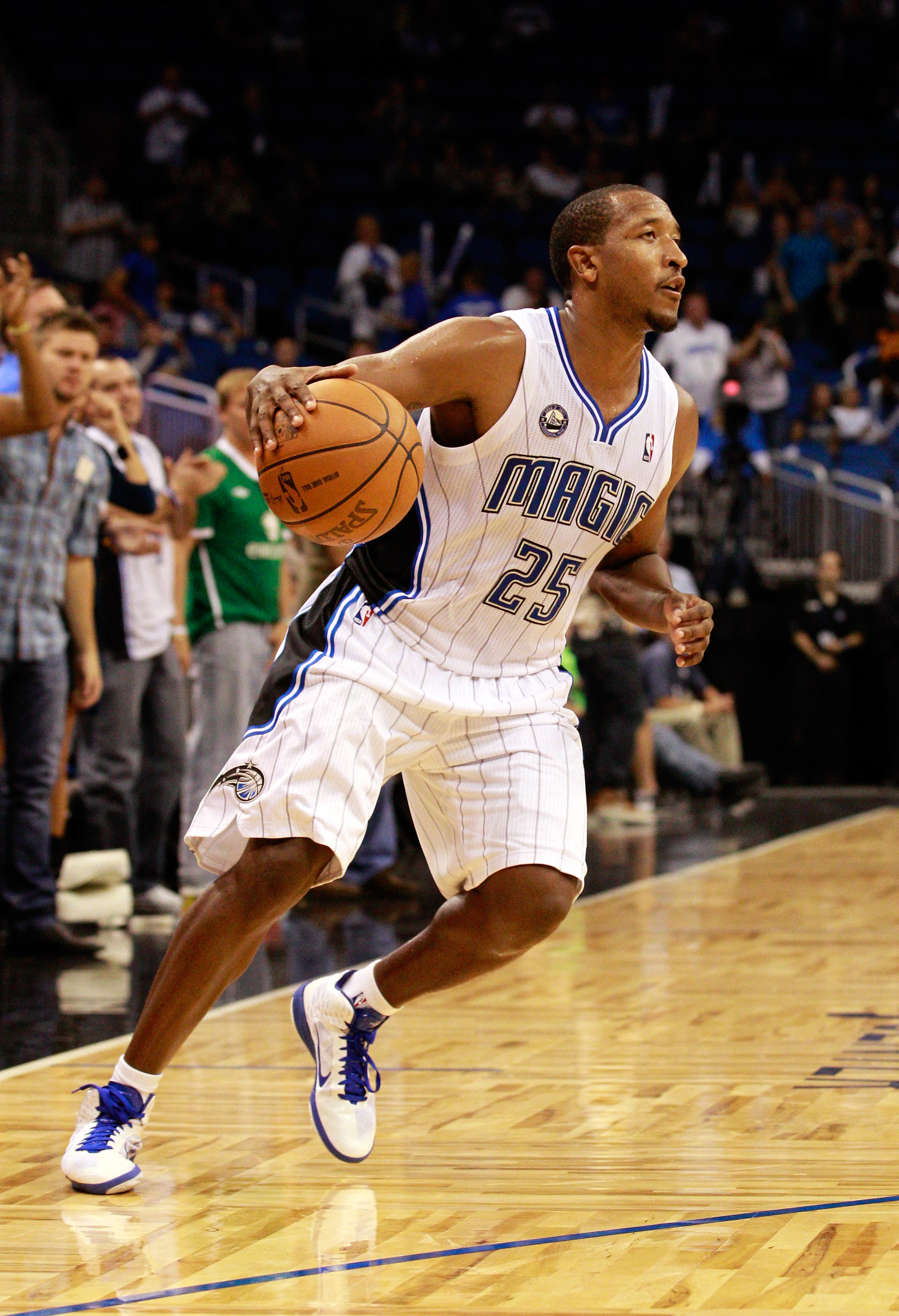 ORLANDO, FL - OCTOBER 10:  Chris Duhon #25 of the Orlando Magic dribbles during the game against the New Orleans Hornets at Amway Arena on October 10, 2010 in Orlando, Florida. NOTE TO USER: User expressly acknowledges and agrees that, by downloading and