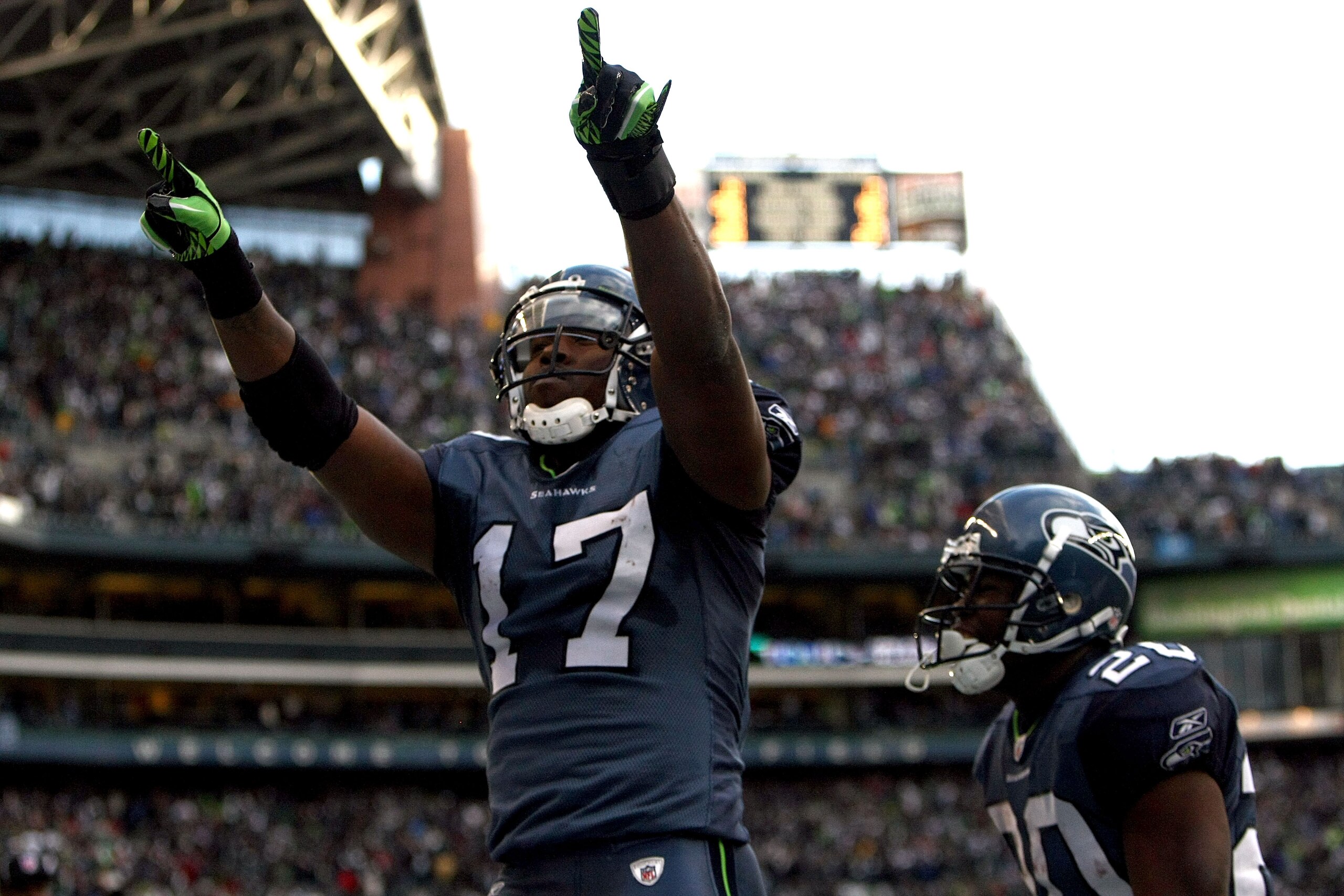 SEATTLE, WA - JANUARY 08:  Wide receiver Mike Williams #17 of the Seattle Seahawks reacts after catching a 38-yard third quarter touchdown pass against the New Orleans Saints during the 2011 NFC wild-card playoff game at Qwest Field on January 8, 2011 in
