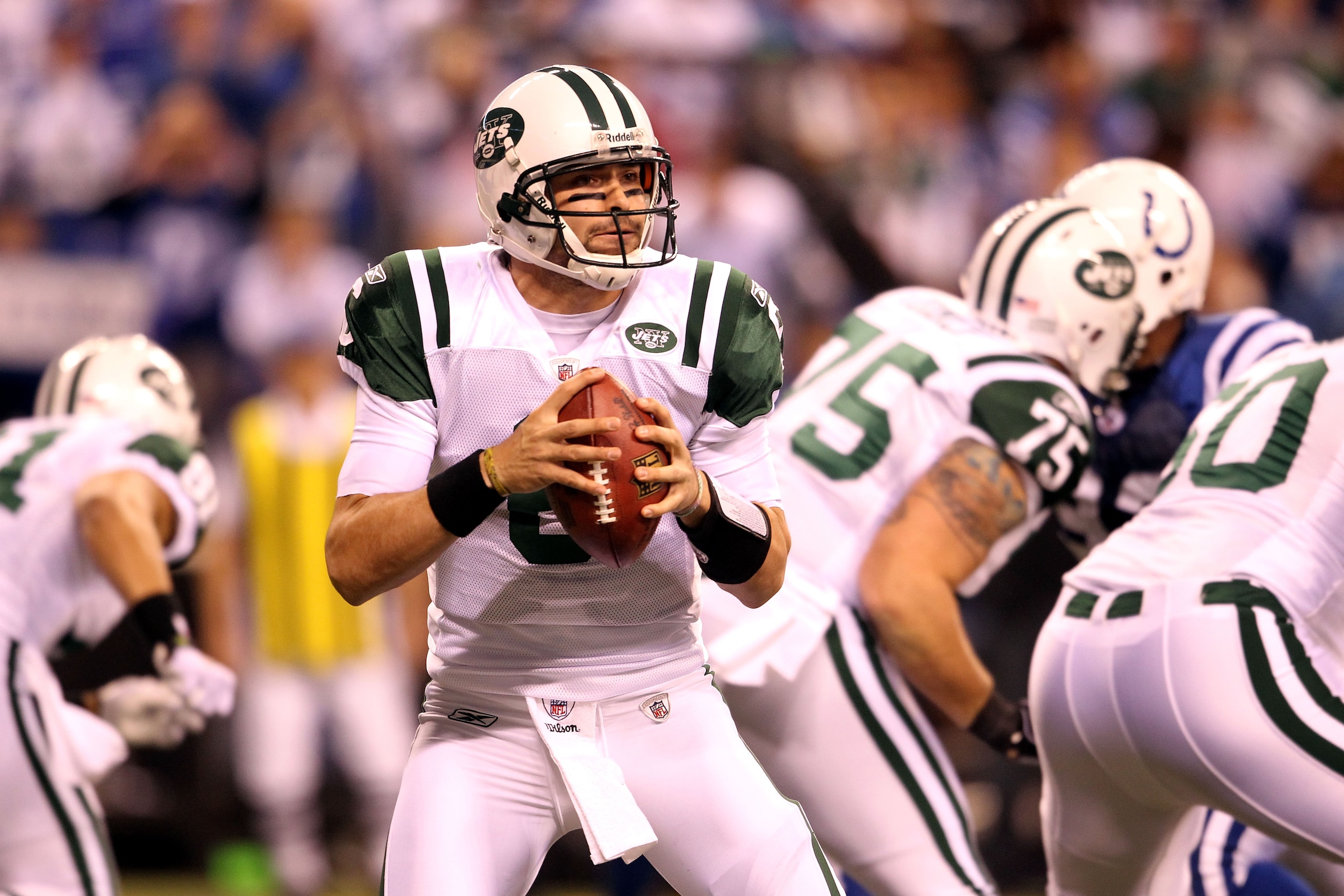 INDIANAPOLIS, IN - JANUARY 08: Mark Sanchez #6 of the New York Jets drops back to pass against the Indianapolis Colts during their 2011 AFC wild card playoff game at Lucas Oil Stadium on January 8, 2011 in Indianapolis, Indiana. The Jets won 17-16. (Pho INDIANAPOLIS, IN - JANUARY 08: Mark Sanchez #6 of the New York Jets drops back to pass against the Indianapolis Colts during their 2011 AFC wild card playoff game at Lucas Oil Stadium on January 8, 2011 in Indianapolis, Indiana. The Jets won 17-16. (Pho