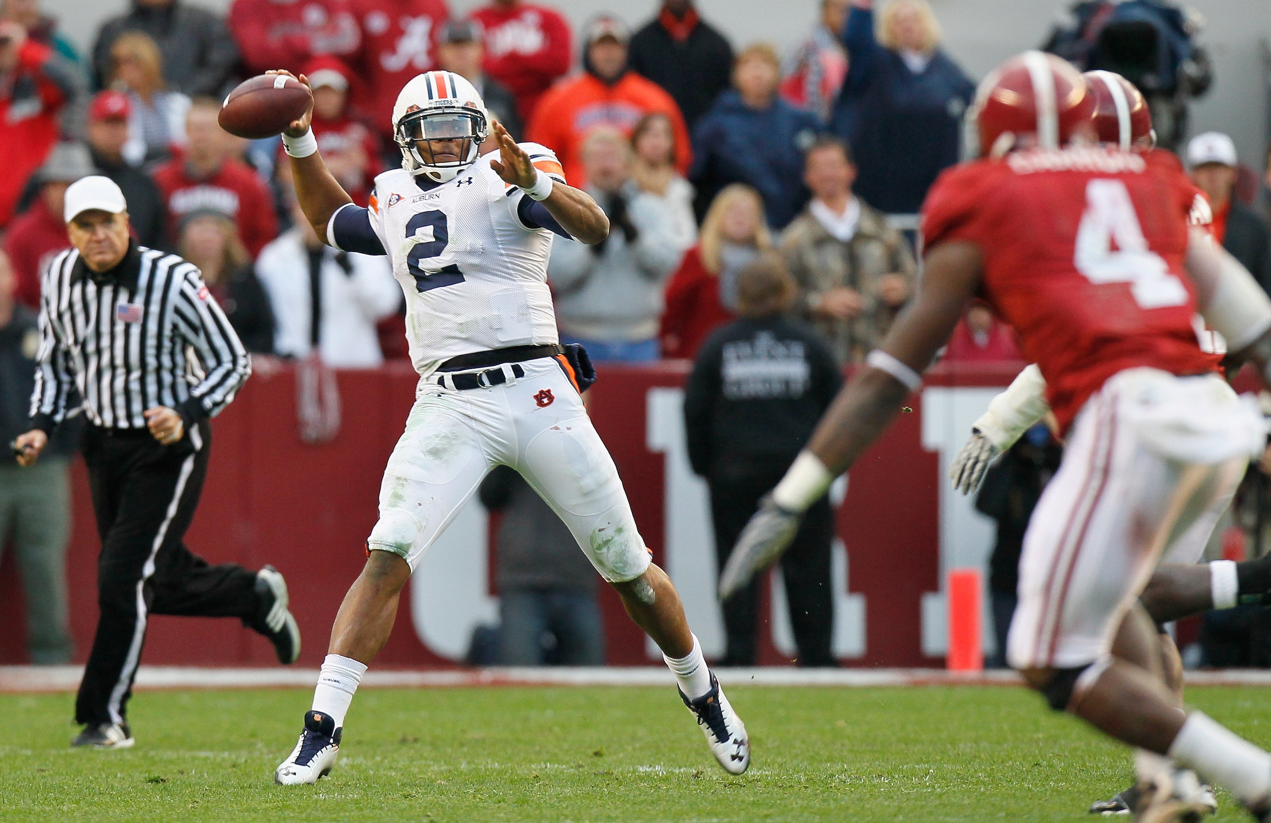 TUSCALOOSA, AL - NOVEMBER 26:  Quarterback Cam Newton #2 of the Auburn Tigers looks to pass against the Alabama Crimson Tide at Bryant-Denny Stadium on November 26, 2010 in Tuscaloosa, Alabama.  (Photo by Kevin C. Cox/Getty Images)