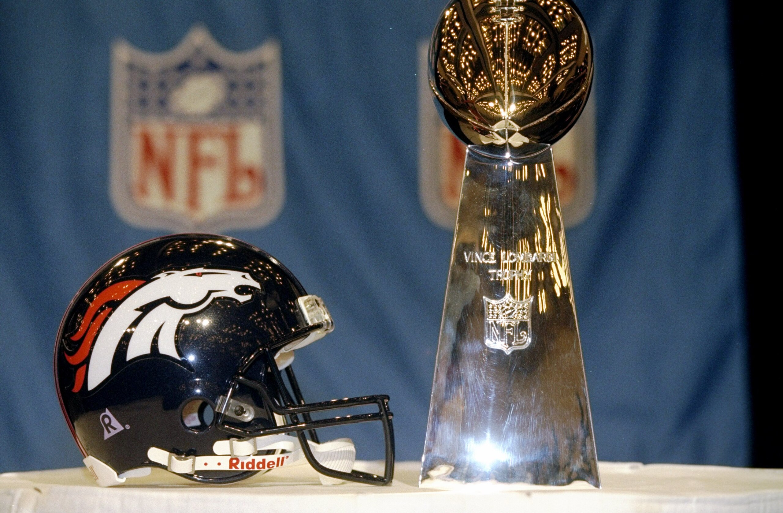 1 Feb 1999:  A close up of the Vince Lombardi Trophy sitting with the Bronco helmet shot after the Super Bowl XXXIII Game between the Denver Broncos and the Atlanta Falcons at the Pro Player Stadium in Miami, Florida. The Broncos defeated the Falcons 34-1