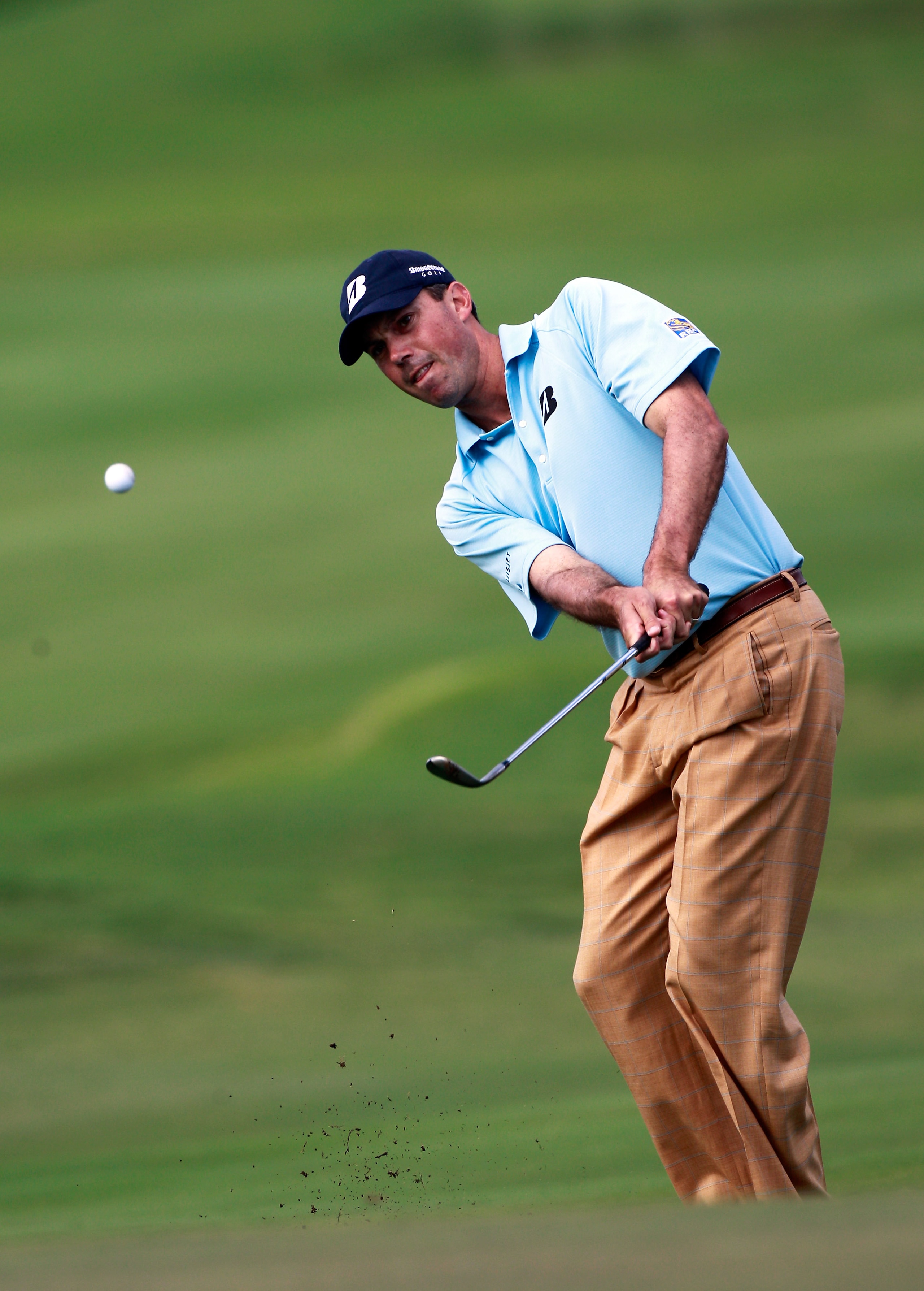 KAPALUA, HI - JANUARY 08:  Matt Kuchar hits a shot on the 14th hole during the third round of the Hyundai Tournament of Champions at the Plantation course on January 8, 2011 in Kapalua, Hawaii.  (Photo by Sam Greenwood/Getty Images)