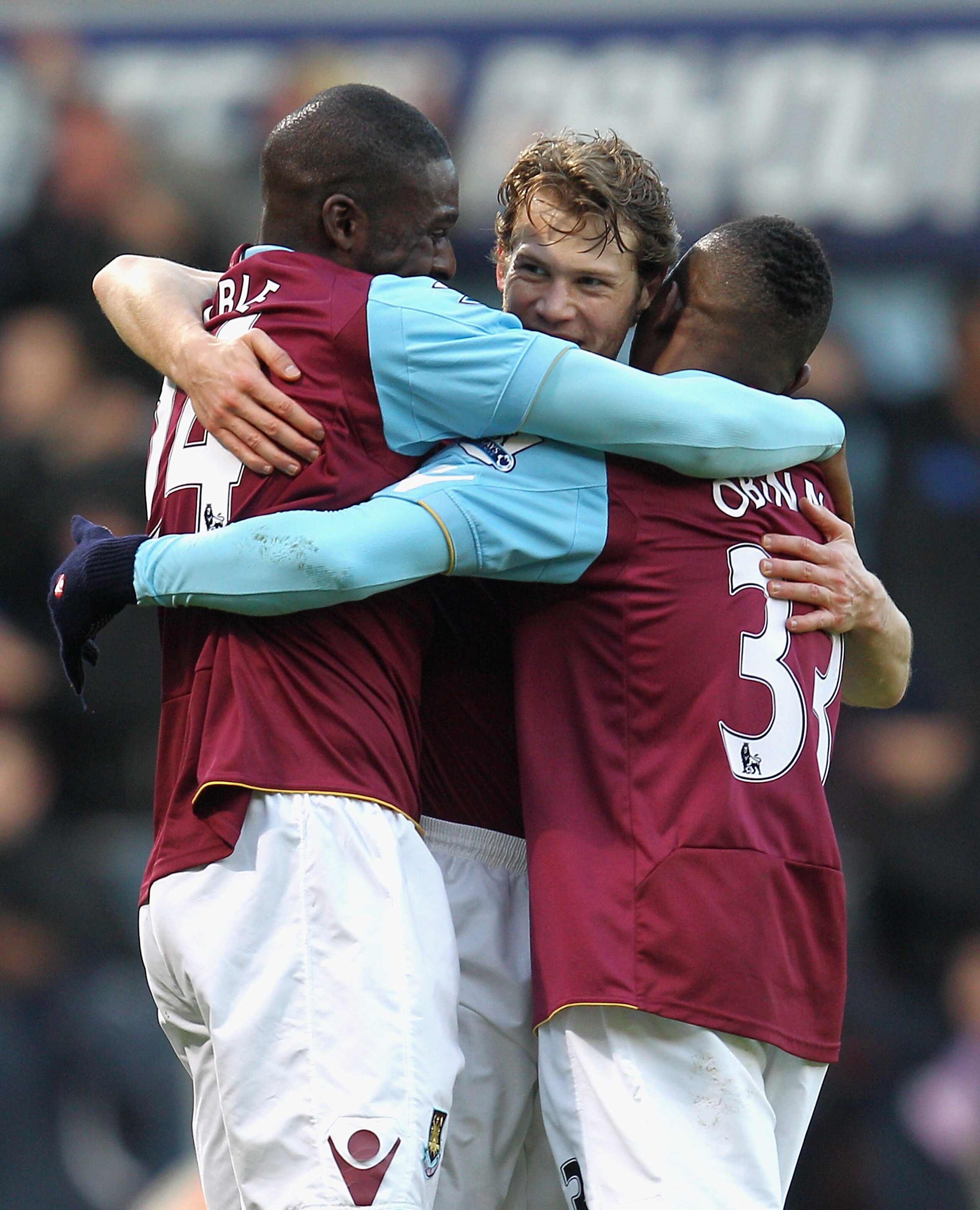 LONDON, ENGLAND - JANUARY 08:  Jonathan Spector of West Ham United (C) celebrates with team mates Frank Nouble (L) and Victor Obinna after scoring the opening goal during the FA Cup sponsored by E.O.N 3rd Round match between West Ham United and Barnsley a