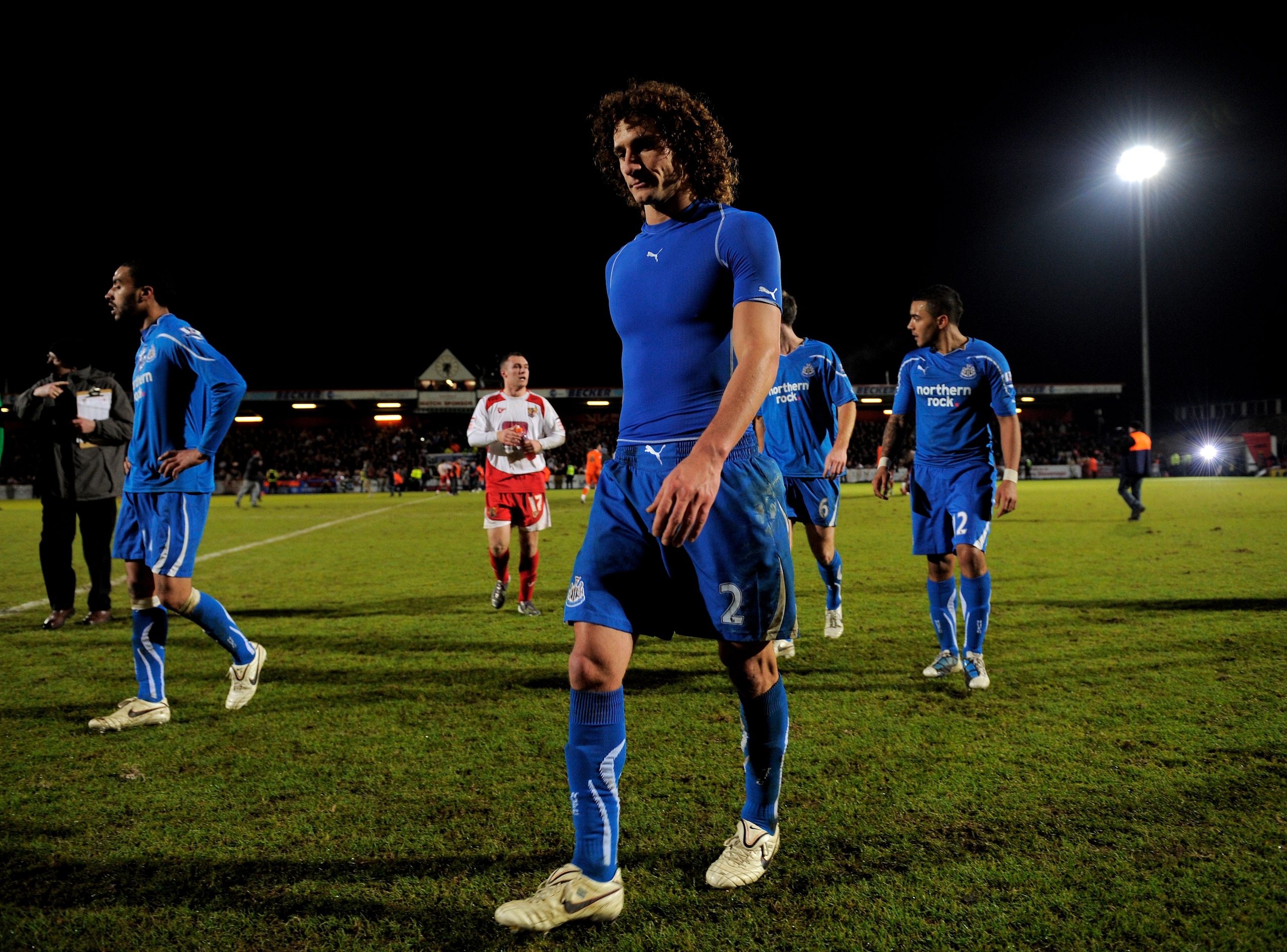 STEVENAGE, ENGLAND - JANUARY 08:  A dejected Fabricio Colloccini of Newcastle walks off the pitch following his team's 3-1 defeat during the FA Cup sponsored by E.ON 3rd round match between Stevenage and Newcastle United at the Lamex Stadium on January 8,