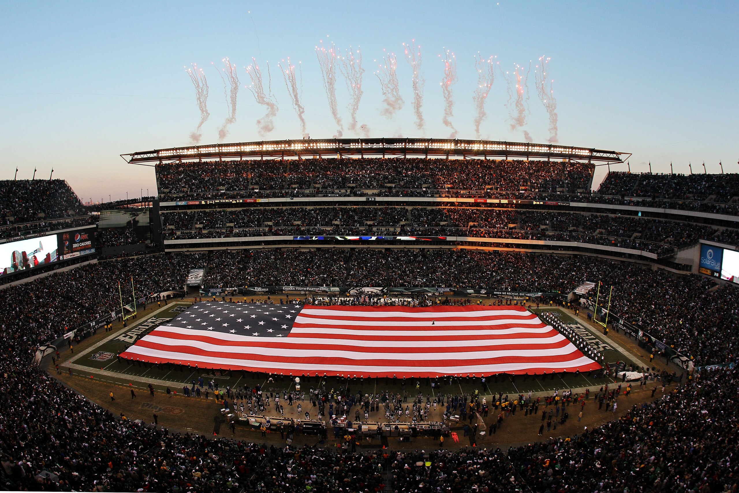 PHILADELPHIA, PA - JANUARY 09:  The color guard presents a full field flag for the national anthem before the game between the Green Bay Packers and the Philadelphia Eagles in the 2011 NFC wild card playoff game at Lincoln Financial Field on January 9, 20