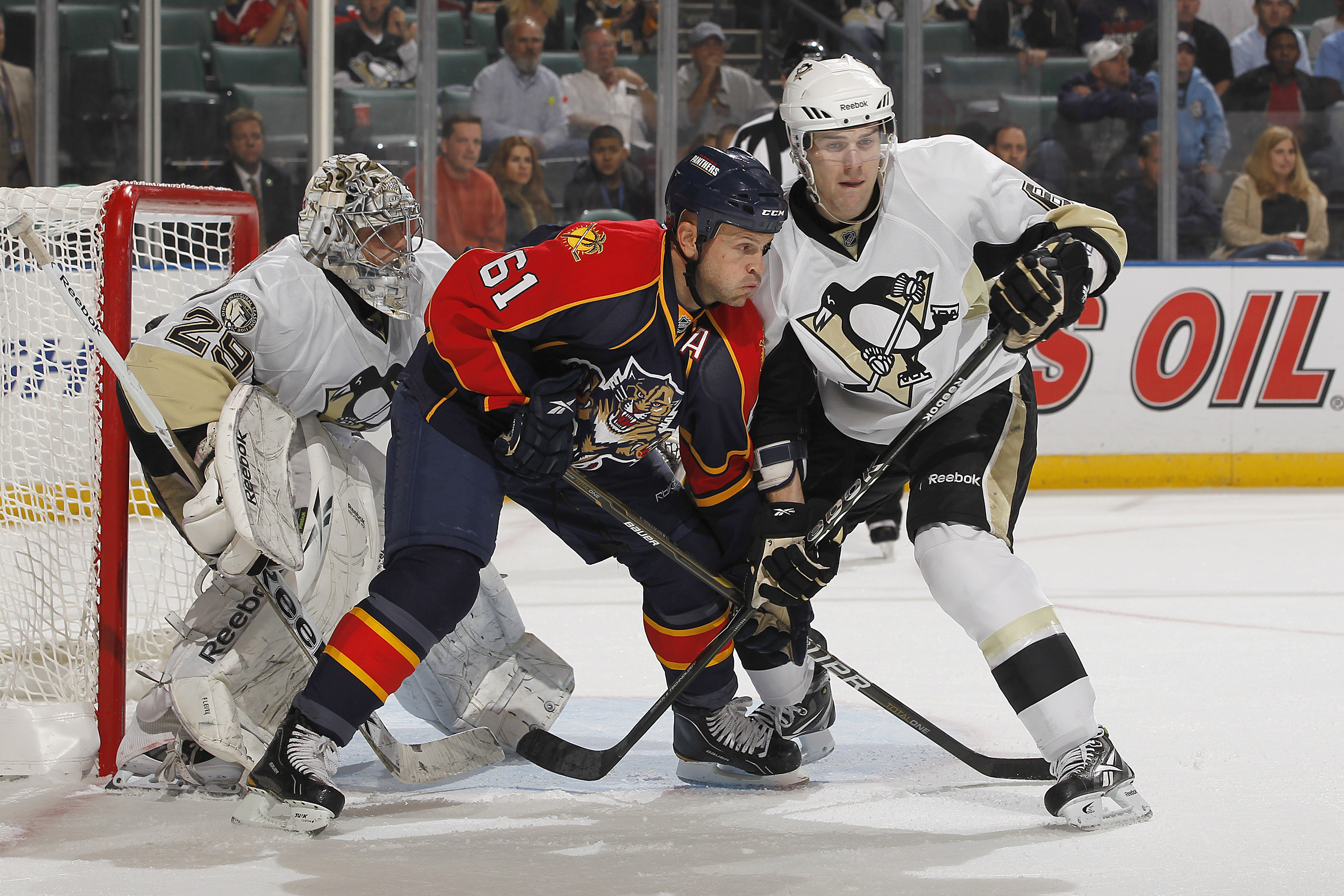 SUNRISE, FL - NOVEMBER 22: Ben Lovejoy #6 of the Pittsburgh Penguins attempts ot defend Cory Stillman #61 of the Florida Panthers in the first period on November 22, 2010 at the BankAtlantic Center in Sunrise, Florida. Stillman scored on the play. (Photo