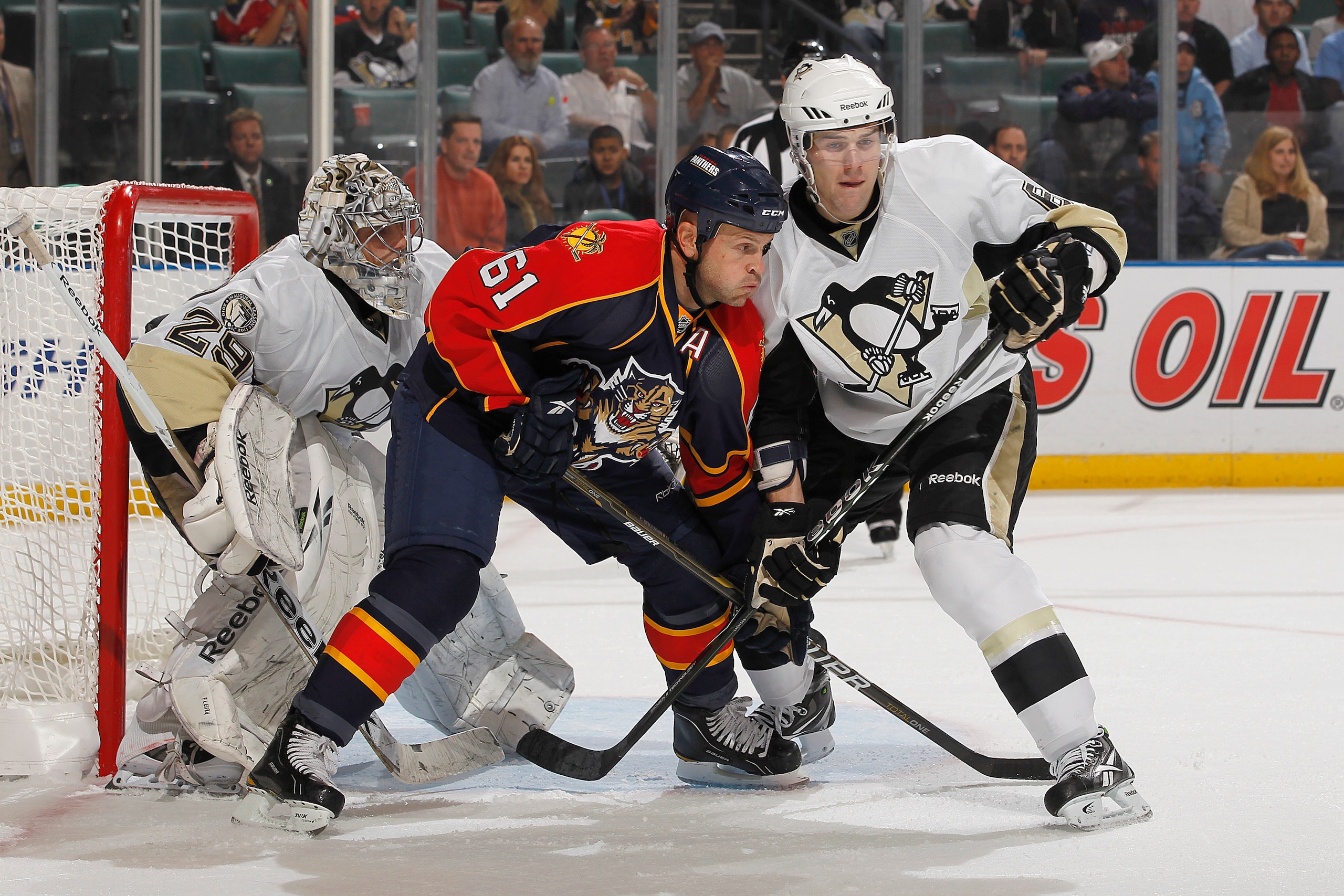 SUNRISE, FL - NOVEMBER 22: Ben Lovejoy #6 of the Pittsburgh Penguins attempts ot defend Cory Stillman #61 of the Florida Panthers in the first period on November 22, 2010 at the BankAtlantic Center in Sunrise, Florida. Stillman scored on the play. (Photo