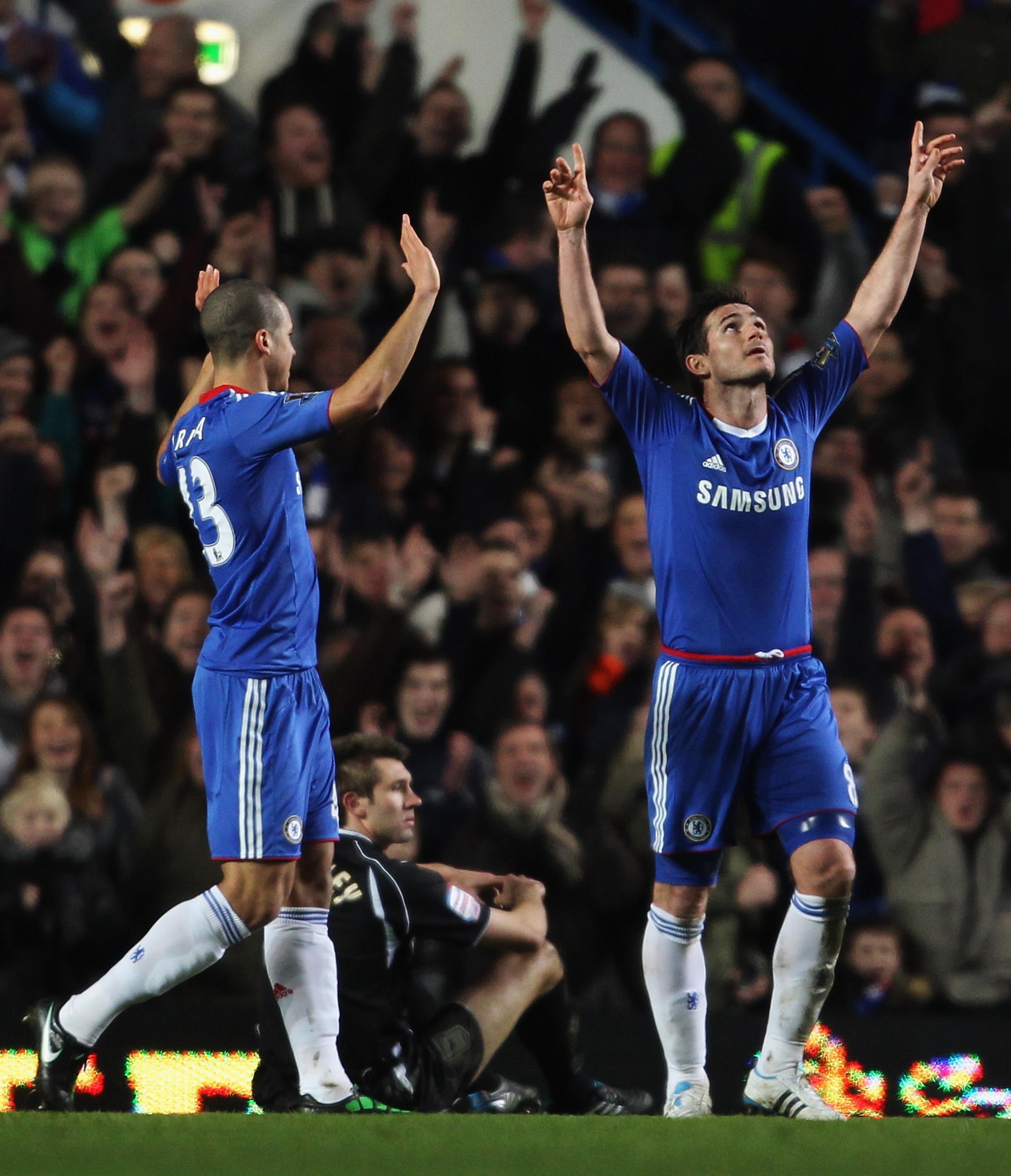 LONDON, ENGLAND - JANUARY 09:  Frank Lampard  of Chelsea celebrates with Jeffrey Bruma as he scores their sixth goal during the FA Cup sponsored by E.ON 3rd round match between Chelsea and Ipswich Town at Stamford Bridge on January 9, 2011 in London, Engl
