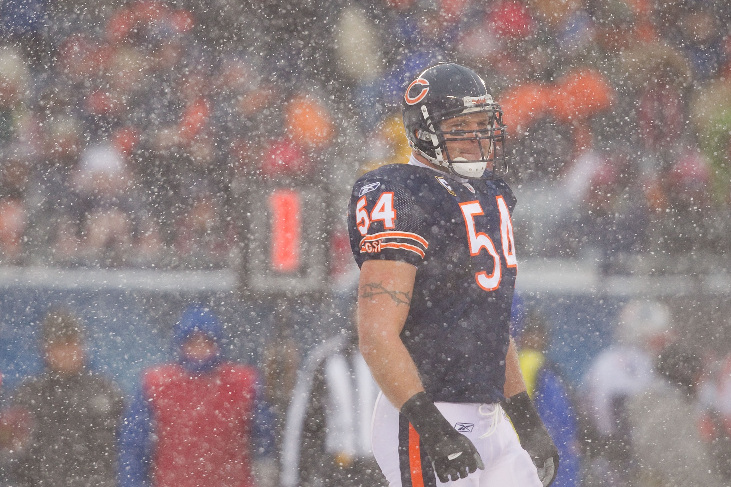CHICAGO, IL - DECEMBER 12: Brian Urlacher #54 of the Chicago Bears looks to the sideline in between plays against the New England Patriots at Soldier Field on December 12, 2010 in Chicago, Illinois.  The Patriots beat the Bears 36-7.  (Photo by Dilip Vish