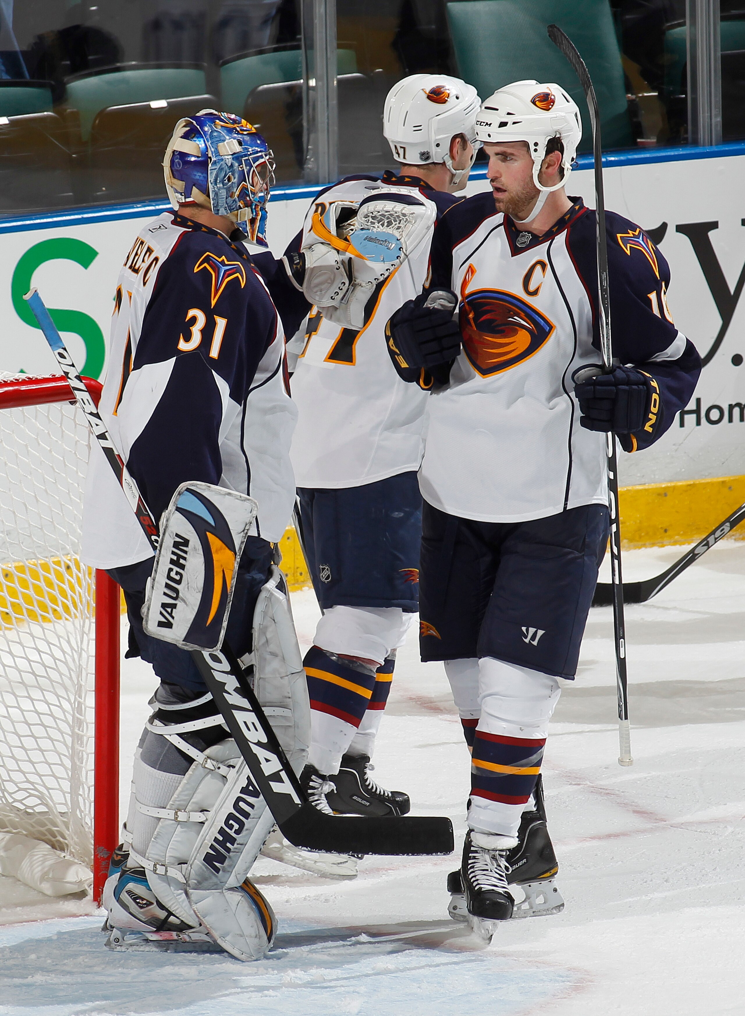 SUNRISE, FL - JANUARY 5: Goaltender Ondrej Pavelec #31 is congratulated by Andrew Ladd #16 of the Atlanta Thrashers after defeating the Florida Panthers 3-2 on January 5, 2011 at the BankAtlantic Center in Sunrise, Florida.  (Photo by Joel Auerbach/Getty