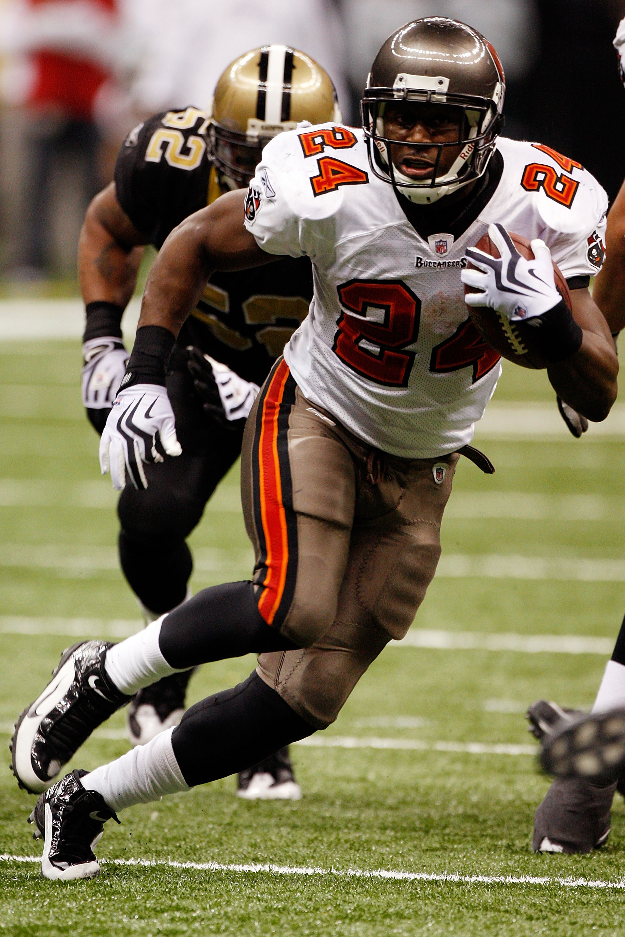 Cincinnati Bengals Brandon Johnson gets a hold of St. Louis Rams Carnell  Williams for the stop in the fourth quarter at the Edward Jones Dome in St.  Louis on December 18, 2011.