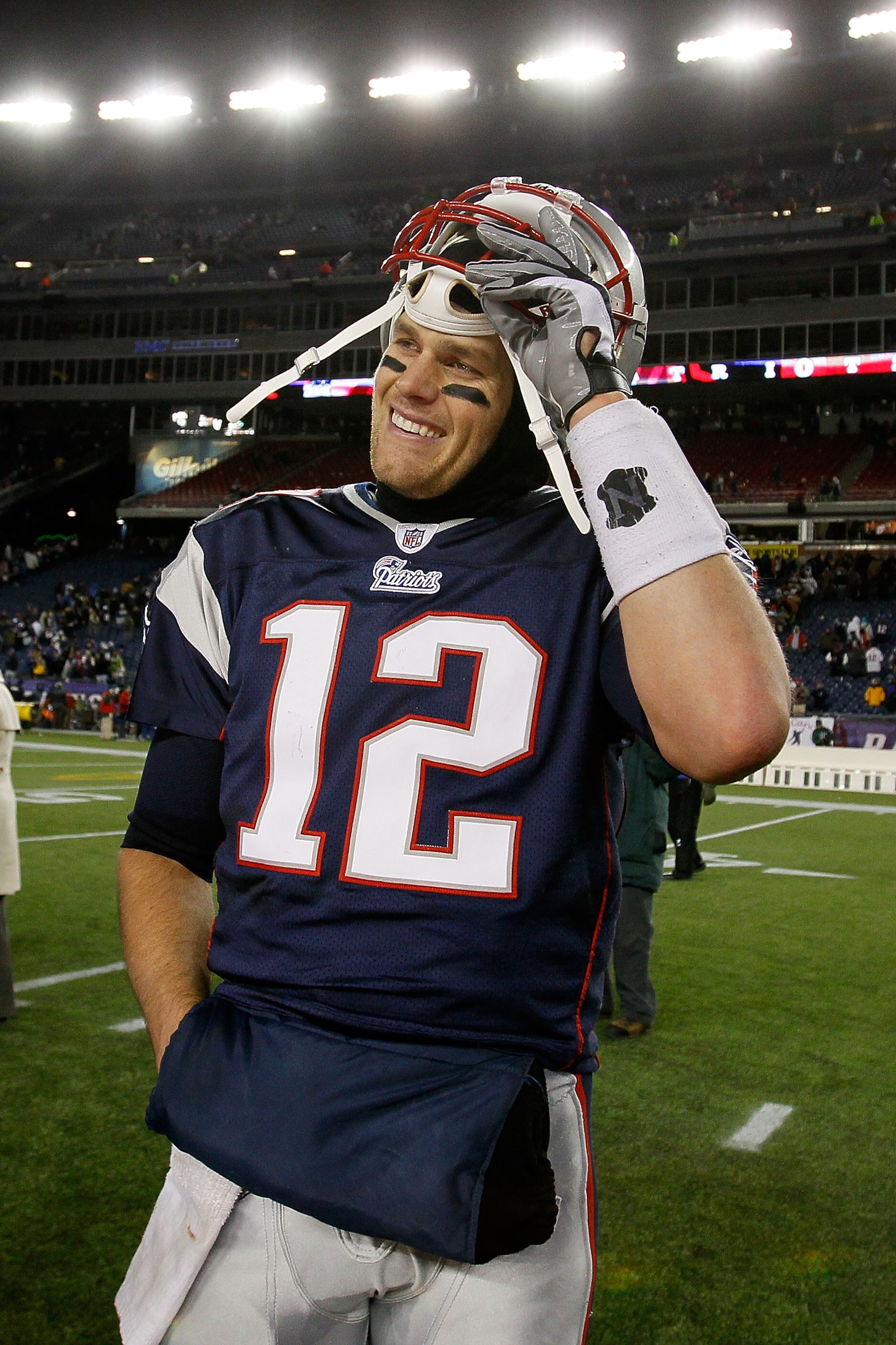 FOXBORO, MA - DECEMBER 06:  Tom Brady #12 of the New England Patriots celebrates after the Patriots won 45-3 against the New York Jets at Gillette Stadium on December 6, 2010 in Foxboro, Massachusetts.  (Photo by Jim Rogash/Getty Images)
