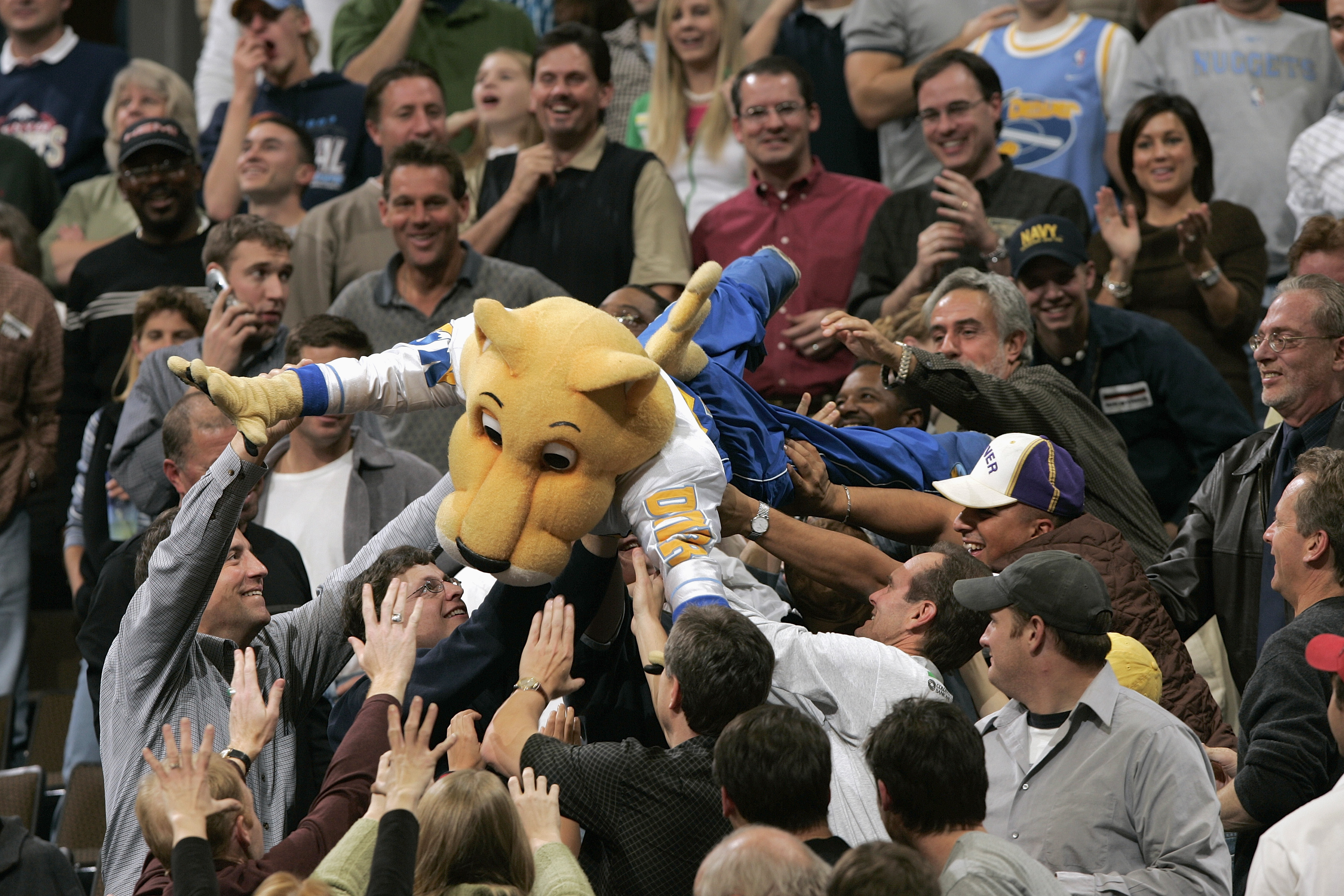 DENVER - NOVEMBER 11:  The Denver Nuggets mascot surfs the crowd during the game with the Detroit Pistons on November 11, 2004 at the Pepsi Center in Denver, Colorado.  The Nuggets won 117-109.    NOTE TO USER: User expressly acknowledges and agrees that,