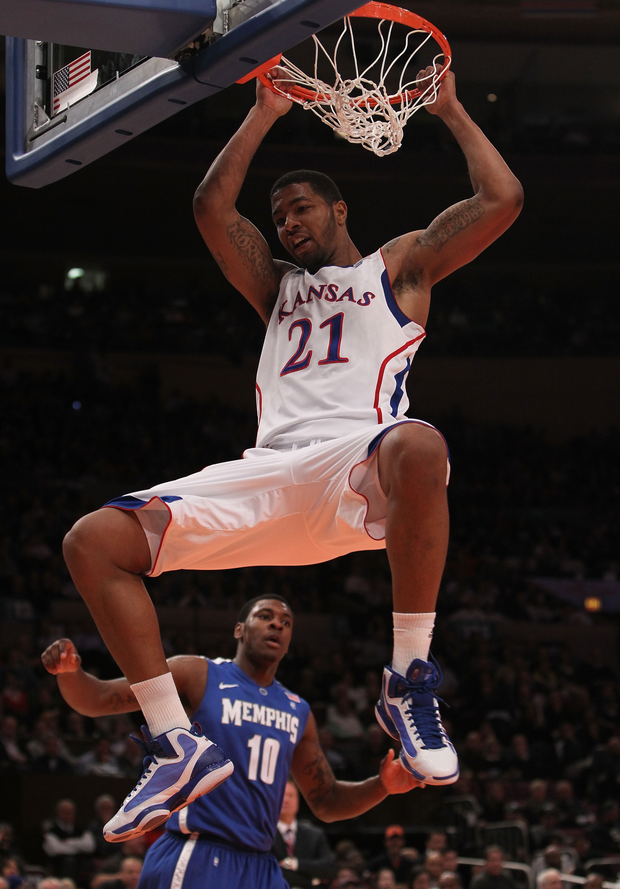 NEW YORK, NY - DECEMBER 07:  Markieff Morris #21 of the Kansas Jayhawks dunks the ball against the Memphis Tigers during their game at the Jimmy V Classic at Madison Square Garden on December 7, 2010 in New York City.  (Photo by Nick Laham/Getty Images)