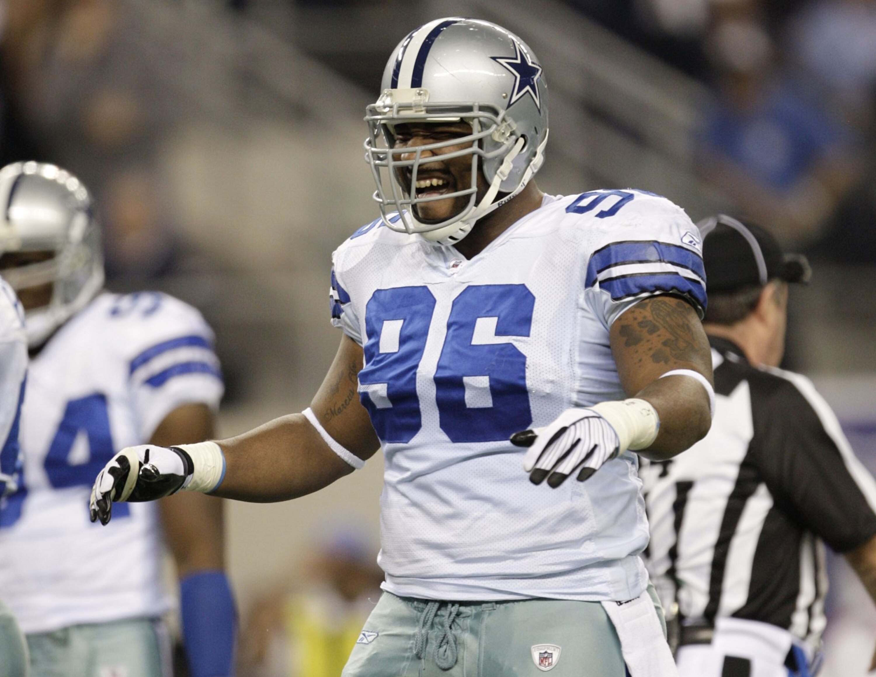 ARLINGTON, TX - JANUARY 9:  Marcus Spears #96 of the Dallas Cowboys reacts in the first quarter against the Philadelphia Eagles during the 2010 NFC wild-card playoff game at Cowboys Stadium on January 9, 2010 in Arlington, Texas. (Photo by Jamie Squire/Ge
