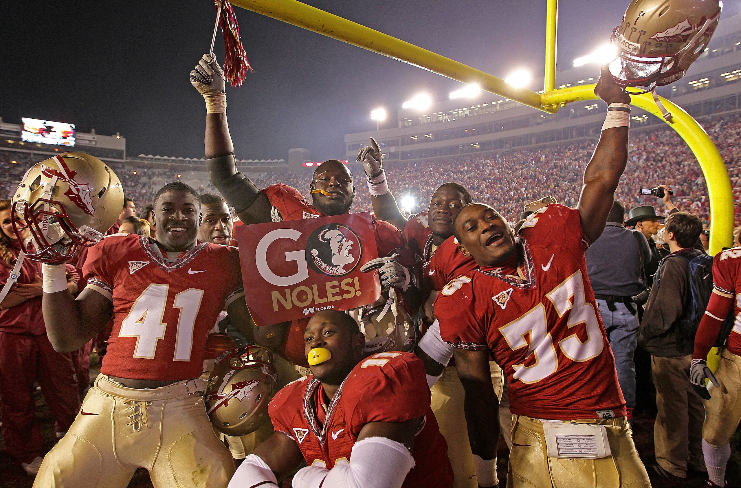 TALLAHASSEE, FL - NOVEMBER 27: Chad Abram #41, Ty Jones #33, Vince Williams #11, and Lonnie Pryor #24 of the Florida State Seminoles celebrate a win against the Florida Gators at Doak Campbell Stadium on November 27, 2010 in Tallahassee, Florida.  (Photo