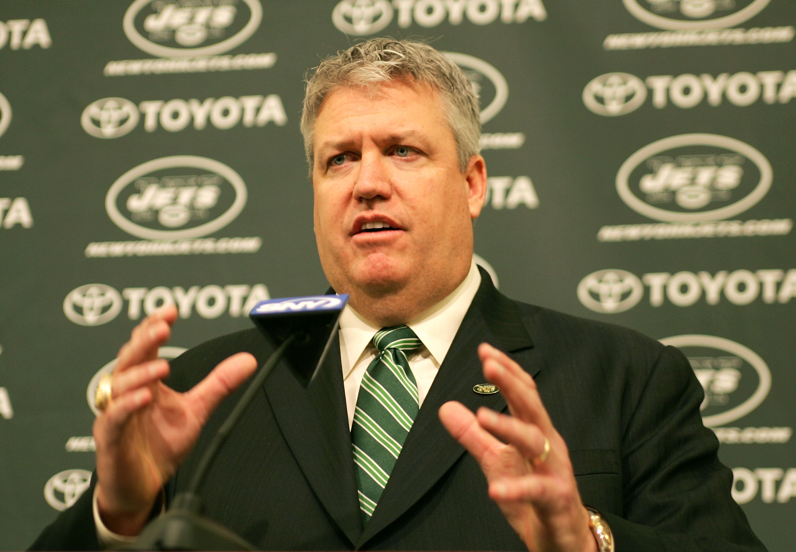 FLORHAM PARK, NJ - JANUARY 21:  Rex Ryan (L) addresses the media during a press conference after being introduced as the new Head Coach of the New York Jets at the Atlantic Health Jets Training Center on January 21, 2009 in Florham Park, New Jersey.  (Pho