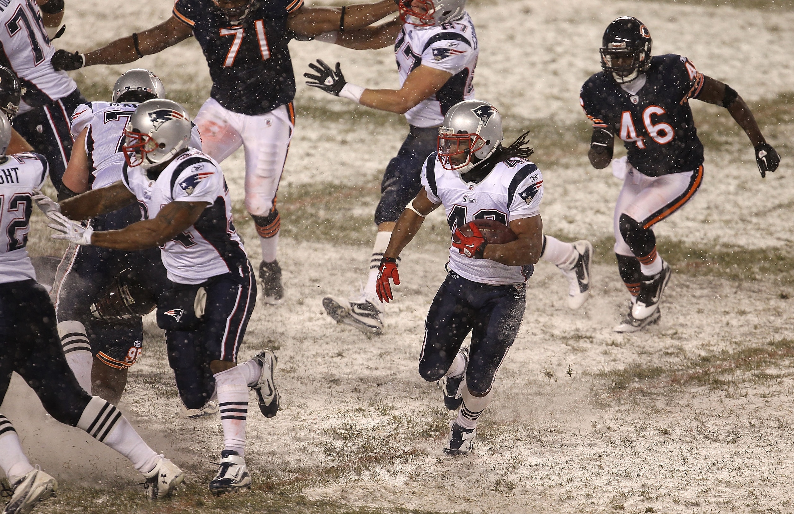 CHICAGO, IL - DECEMBER 12: Ben-Jarvus Green-Ellis #42 of the New England Patriots looks for running room pursued by Chris Harris #46 of the Chicago Bears at Soldier Field on December 12, 2010 in Chicago, Illinois. The Patriots defeated the Bears 36-7. (Ph