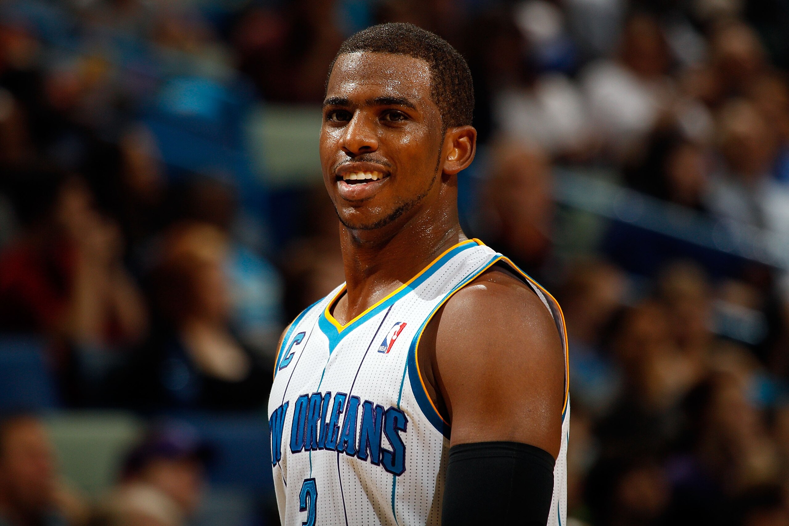 NEW ORLEANS, LA - DECEMBER 22:  Chris Paul #3  of the New Orleans Hornets smiles as he walks off the court during the game against the New Jersey Nets at the New Orleans Arena on December 22, 2010 in New Orleans, Louisiana.  The Hornets defeated the Nets
