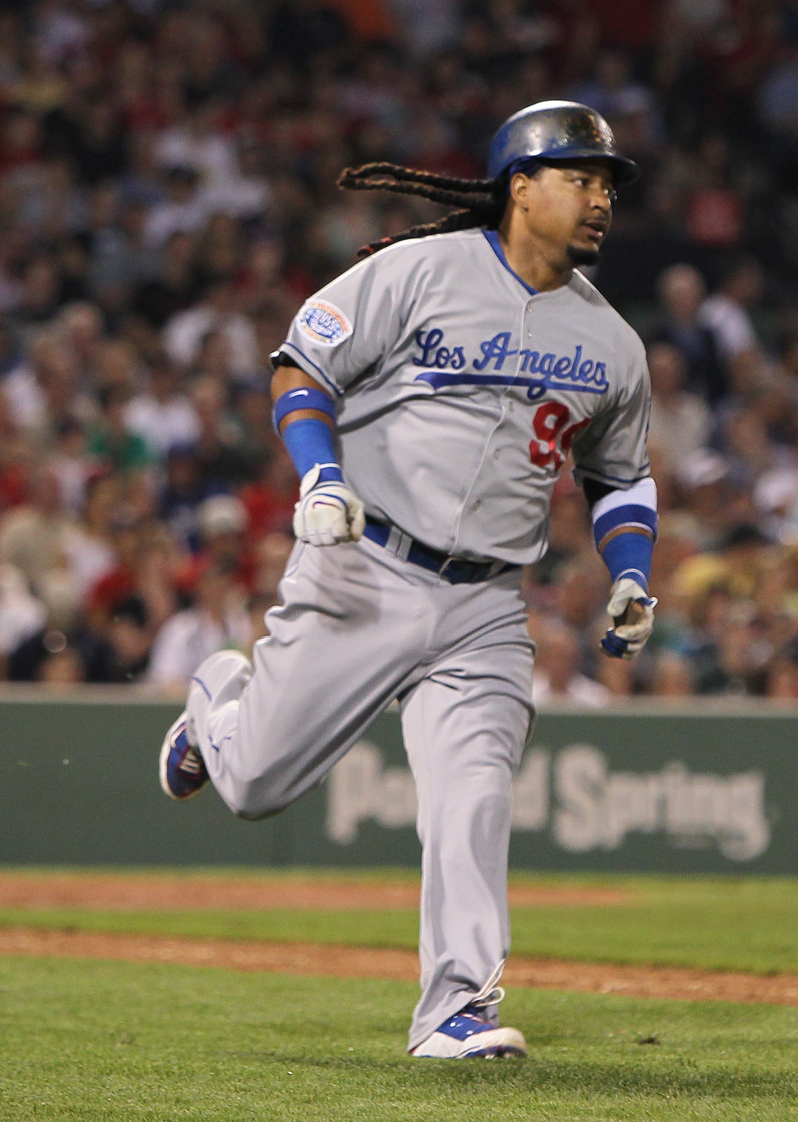 BOSTON - JUNE 18:  Manny Ramirez #99 of the Los Angeles Dodgers singles in the 6th against the Boston Red Sox at Fenway Park on June 18, 2010 in Boston, Massachusetts. (Photo by Jim Rogash/Getty Images)