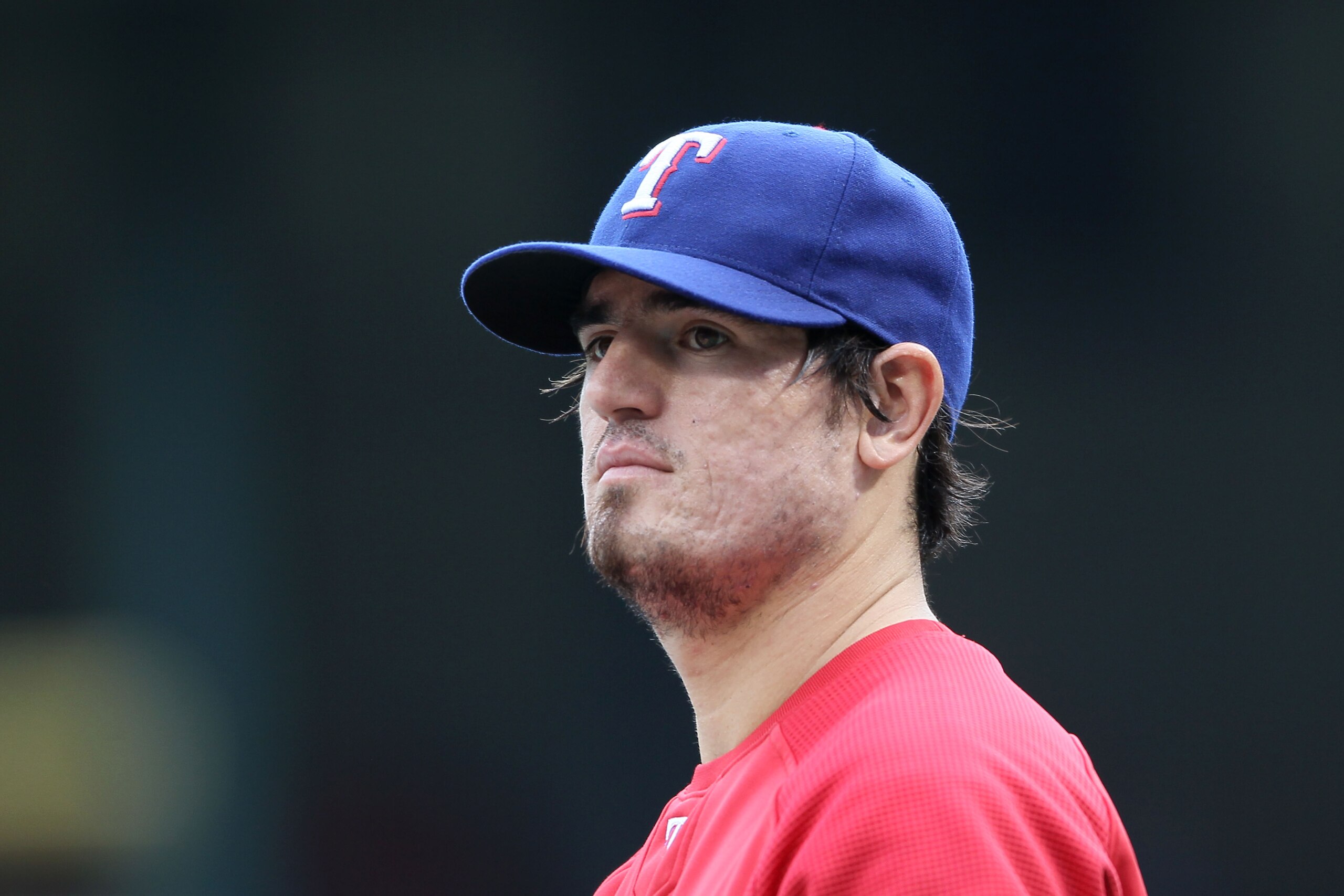 ARLINGTON, TX - OCTOBER 22:  Jorge Cantu #8 of the Texas Rangers looks on during batting practice against the New York Yankees in Game Six of the ALCS during the 2010 MLB Playoffs at Rangers Ballpark in Arlington on October 22, 2010 in Arlington, Texas.