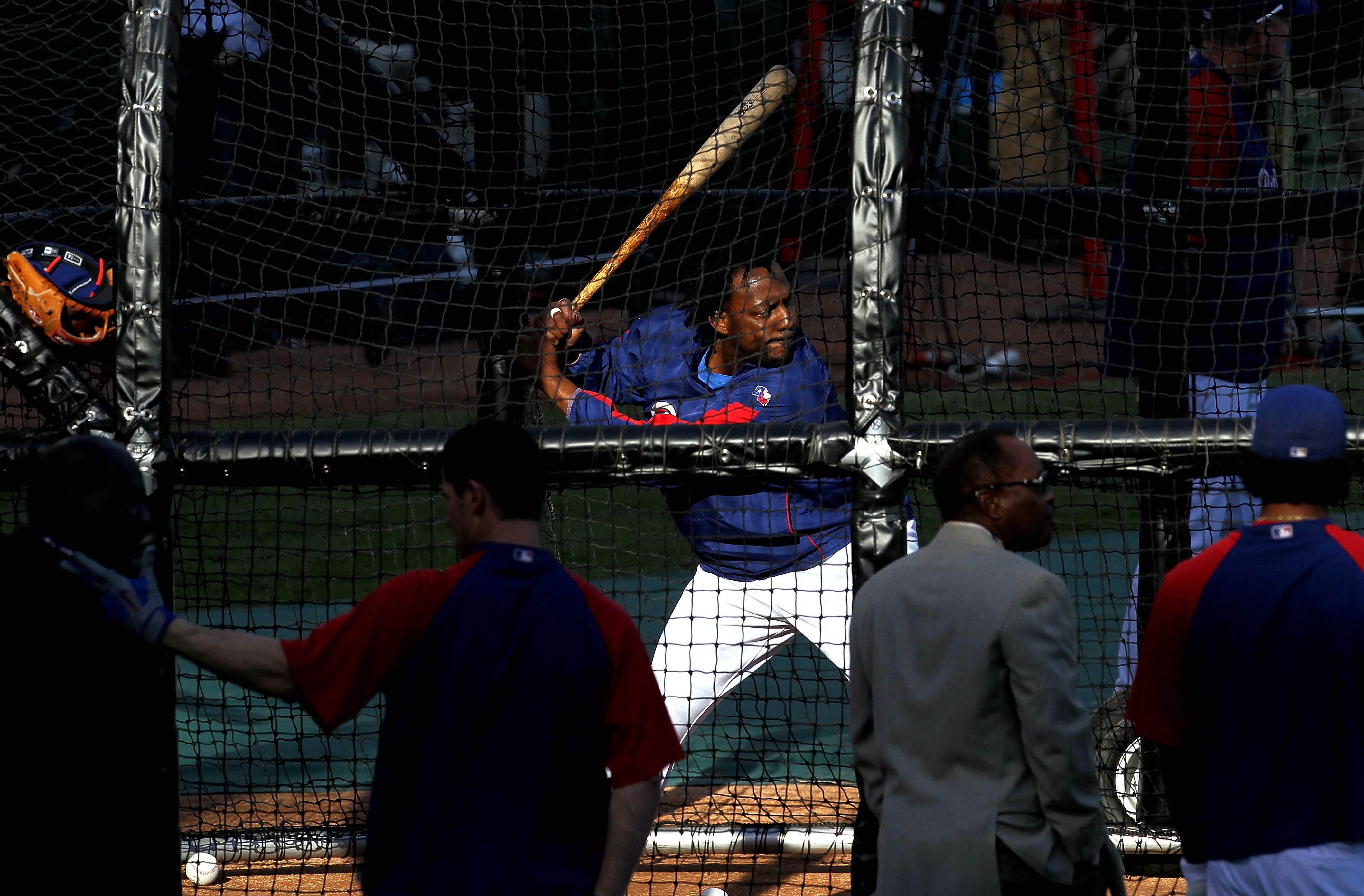 ARLINGTON, TX - NOVEMBER 01:  Vladimir Guerrero #27 of the Texas Rangers takes batting practice against the San Francisco Giants in Game Five of the 2010 MLB World Series at Rangers Ballpark in Arlington on November 1, 2010 in Arlington, Texas.  (Photo by