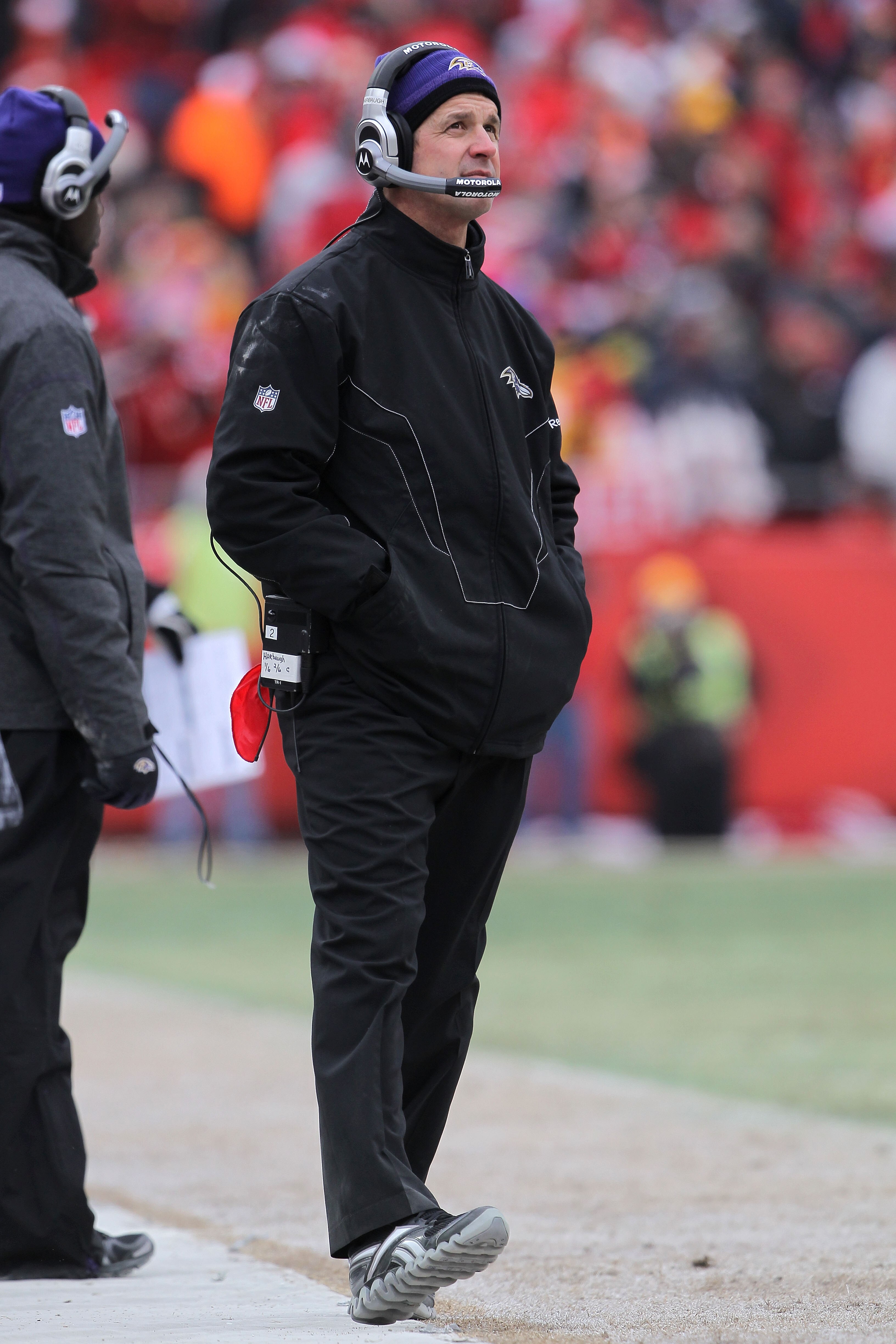 KANSAS CITY, MO - JANUARY 09:  Head coach John Harbaugh of the Baltimore Ravens looks on from the sidelines during their 2011 AFC wild card playoff game against the Kansas City Chiefs at Arrowhead Stadium on January 9, 2011 in Kansas City, Missouri.  (Pho
