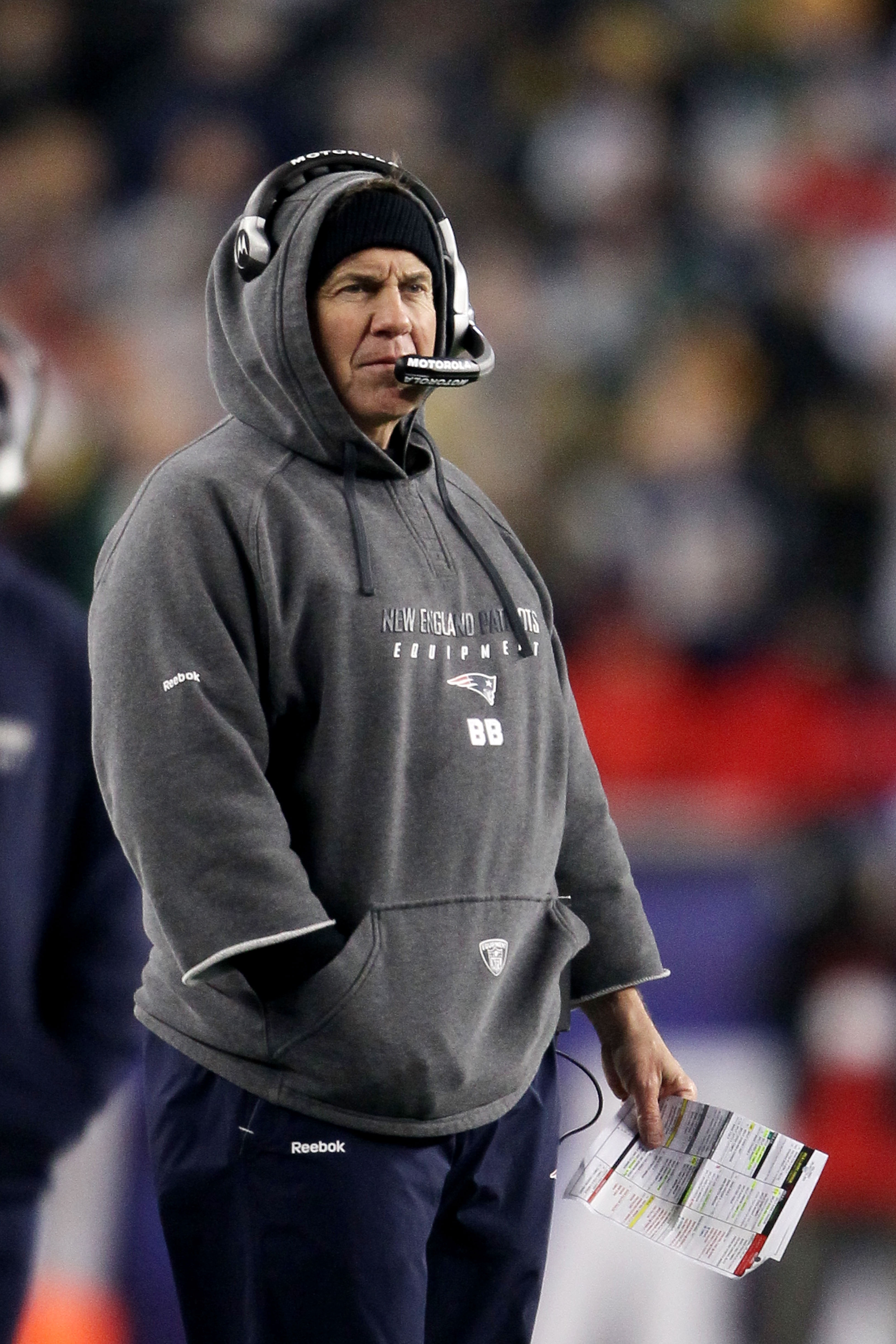 FOXBORO, MA - DECEMBER 19:  Bill Belichick, head coach of the New England Patriots, looks on during the second quarter of the game against the Green Bay Packers at Gillette Stadium on December 19, 2010 in Foxboro, Massachusetts.  (Photo by Elsa/Getty Imag