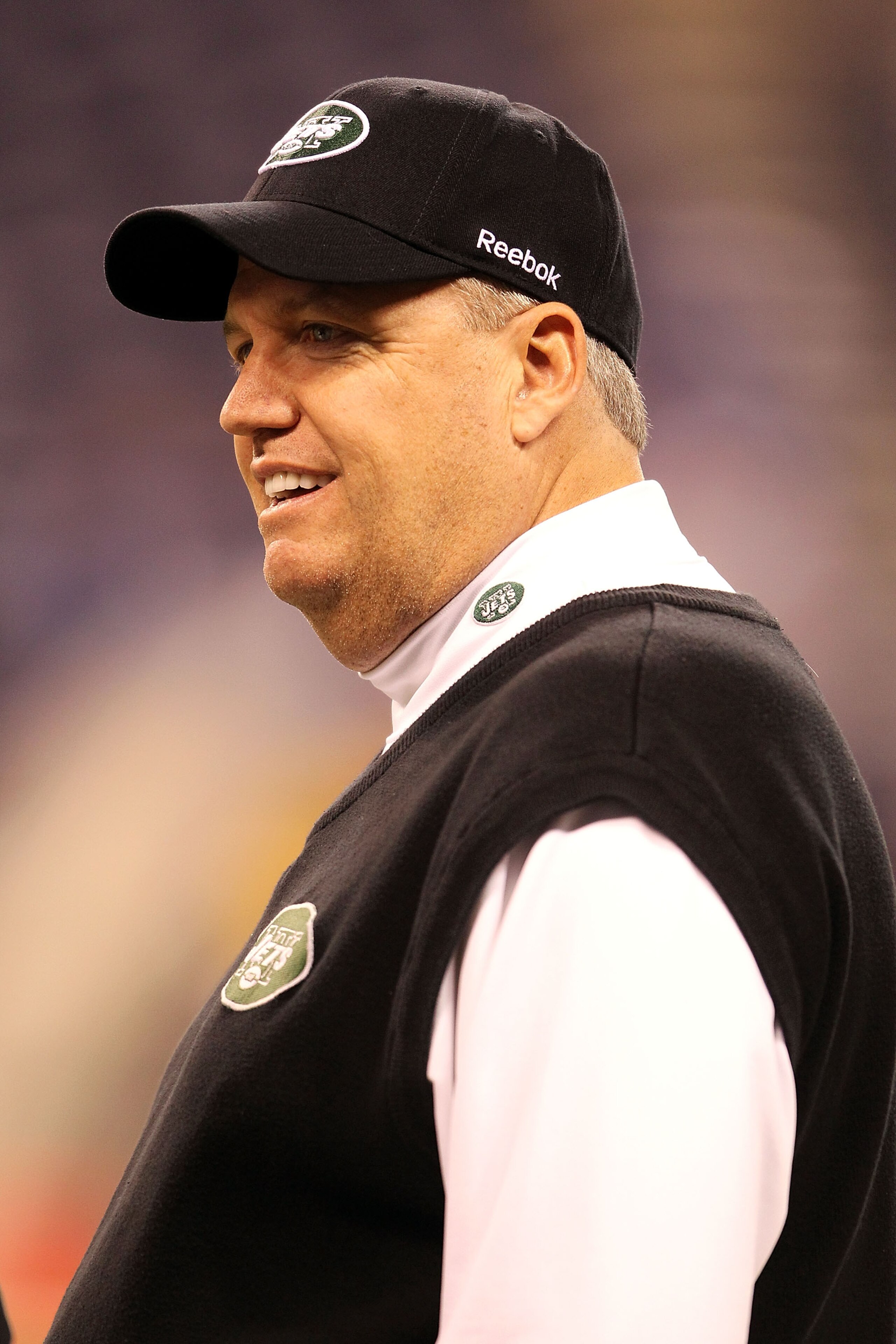 INDIANAPOLIS, IN - JANUARY 08:  Head coach Rex Ryan of the New York Jets looks on during warm ups against the Indianapolis Colts during their 2011 AFC wild card playoff game at Lucas Oil Stadium on January 8, 2011 in Indianapolis, Indiana.  (Photo by Andy