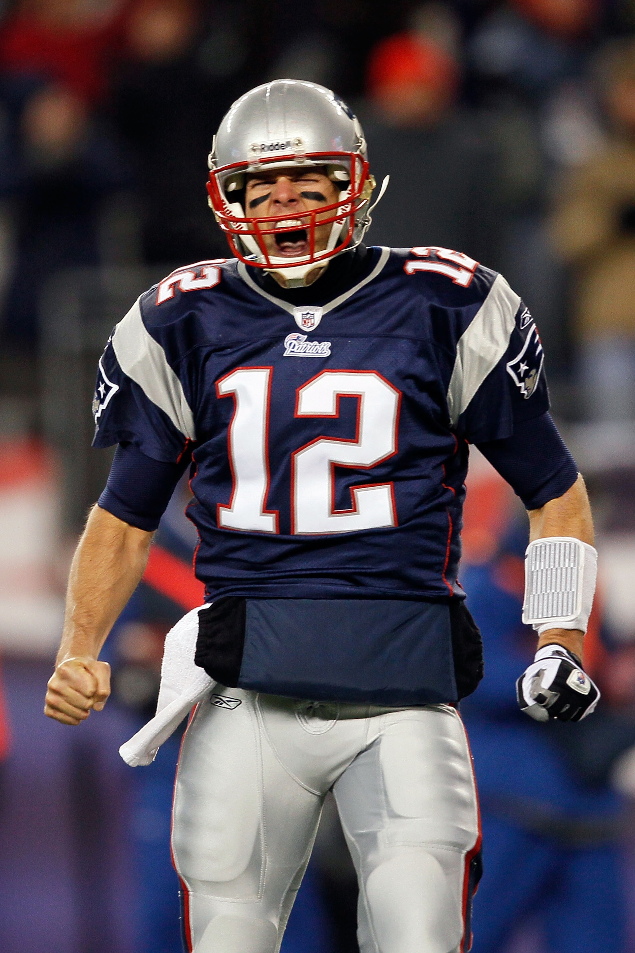 FOXBORO, MA - DECEMBER 06:  Tom Brady #12 of the New England Patriots reacts after BenJarvus Green-Ellis scored a 1-yard rushing touchdown in the first quarter against the New York Jets at Gillette Stadium on December 6, 2010 in Foxboro, Massachusetts.  (