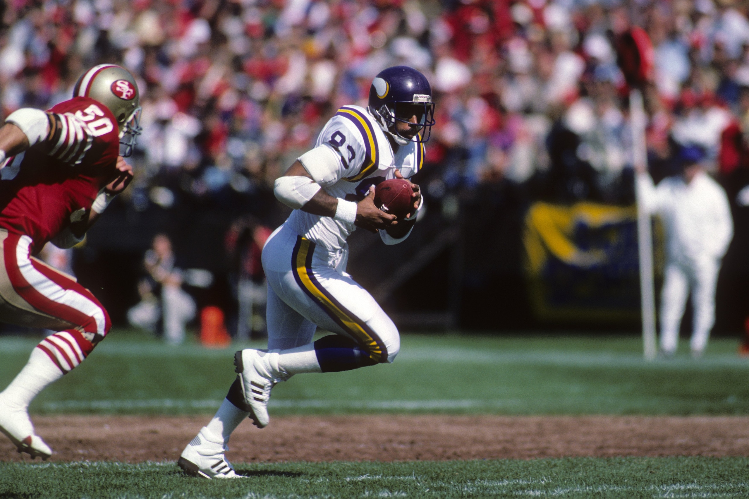 SAN FRANCISCO - OCTOBER 12:  Tight end Steve Jordan #83 of the Minnesota Vikings runs with the ball during the game against the San Francisco 49ers at Candlestick Park on October 12, 1986 in San Francisco, California.  The Minnesota Vikings won 27-24 in o