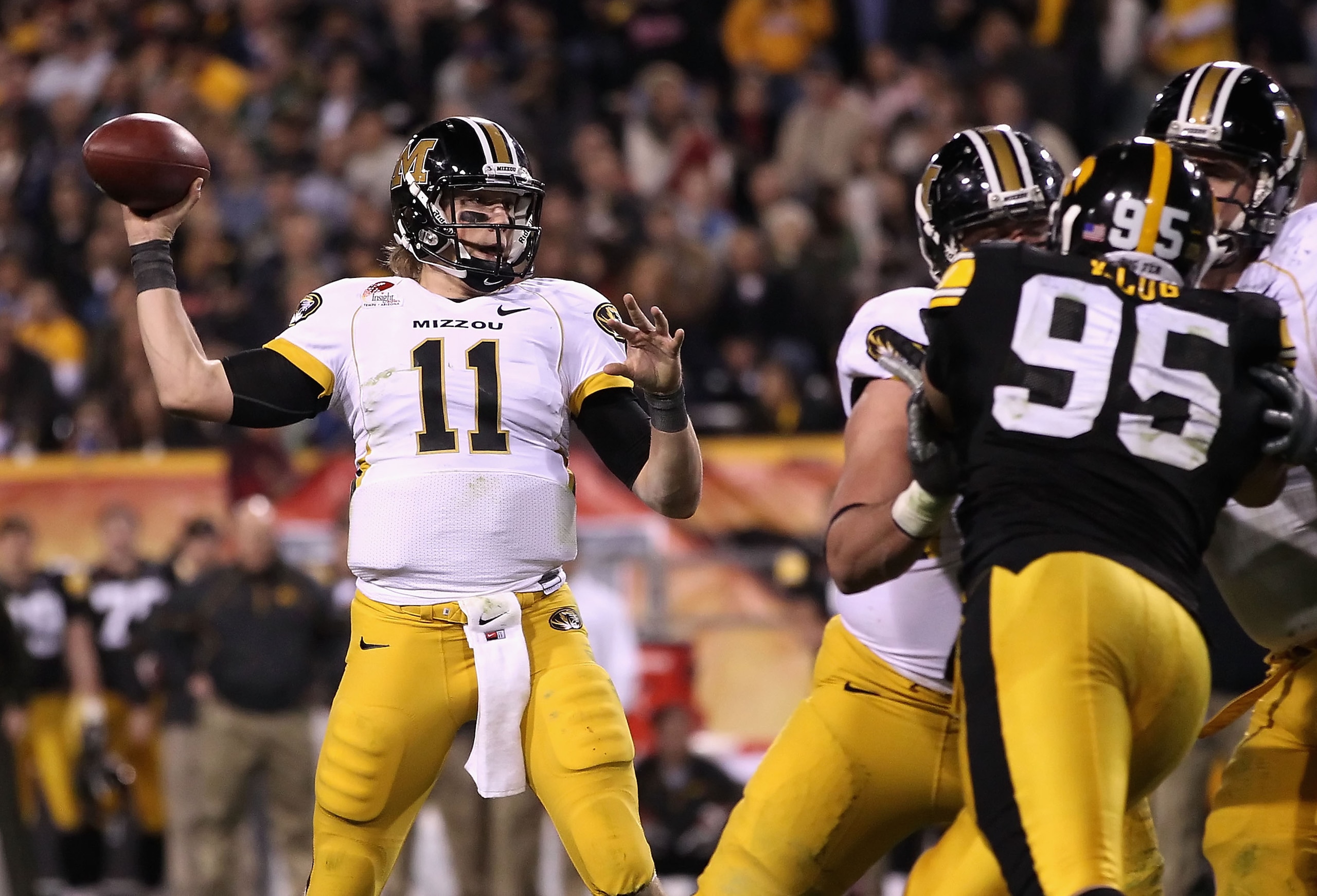 TEMPE, AZ - DECEMBER 28: Quarterback Blaine Gabbert #11 of the Missouri Tigers drops back to pass during the Insight Bowl against the Iowa Hawkeyes at Sun Devil Stadium on December 28, 2010 in Tempe, Arizona. The Hawkeyes defeated the Tigers 27-24. (P TEMPE, AZ - DECEMBER 28: Quarterback Blaine Gabbert #11 of the Missouri Tigers drops back to pass during the Insight Bowl against the Iowa Hawkeyes at Sun Devil Stadium on December 28, 2010 in Tempe, Arizona. The Hawkeyes defeated the Tigers 27-24. (P