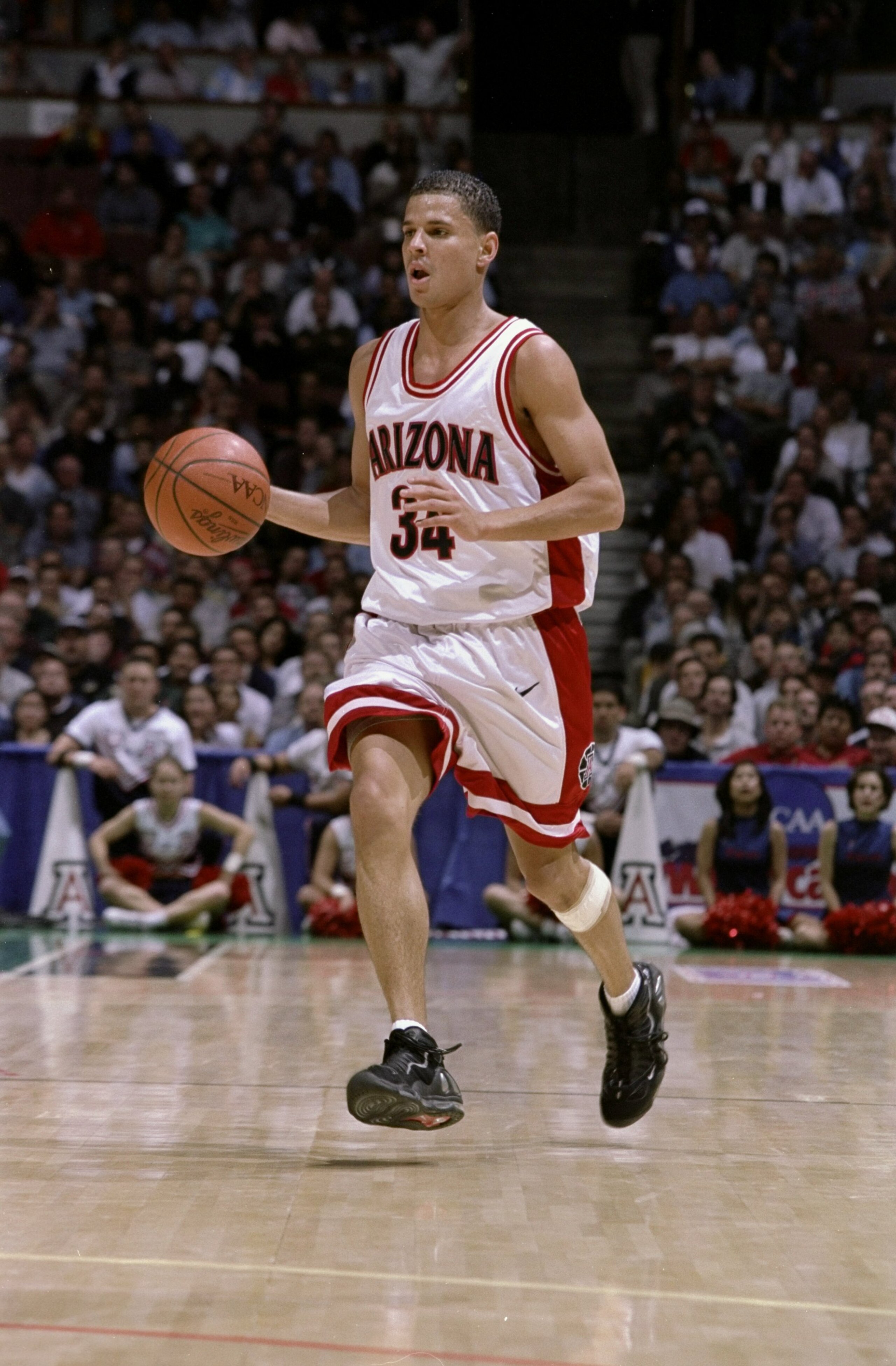 19 Mar 1998:  Guard Miles Simon of the Arizona Wildcats in action against the Maryland Terrapins during an NCAA tournament game at Arrowhead Pond in Anaheim, California.  Arizona defeated Maryland 87-73. Mandatory Credit: Todd Warshaw  /Allsport