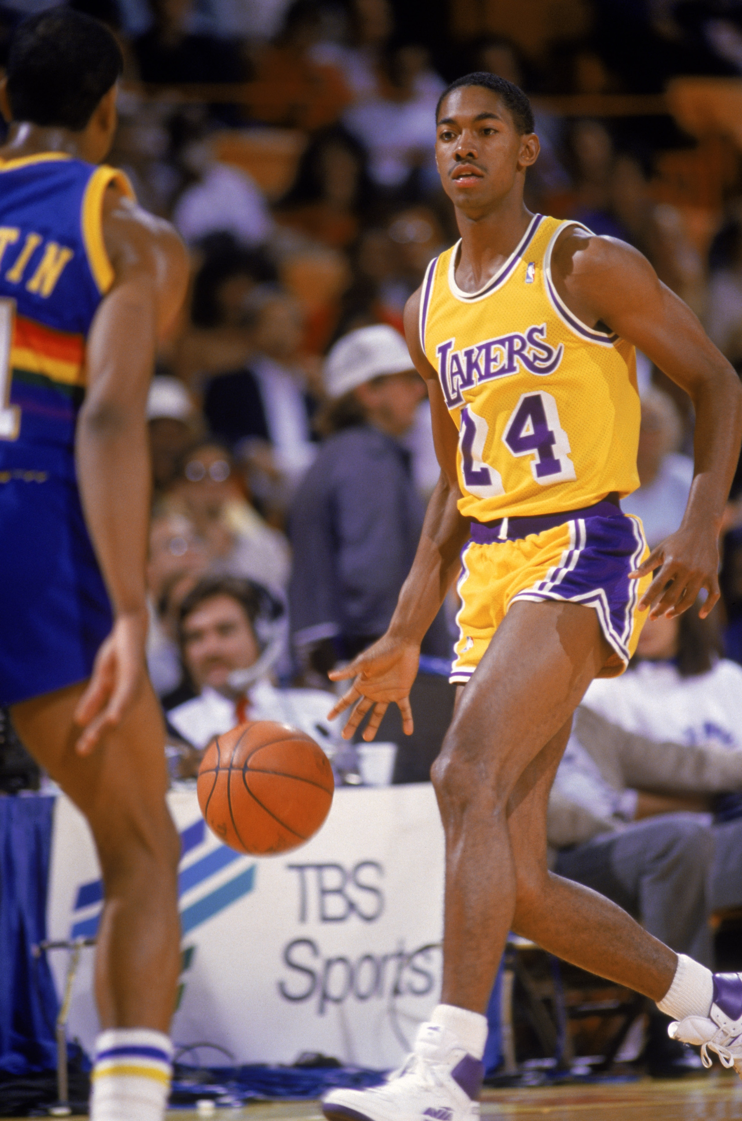 LOS ANGELES - 1986:  Adrian Branch #24 of the Los Angeles Lakers dribbles the ball during an NBA game against the Denver Nuggets at the Great Western Forum in Los Angeles, California in 1986. (Photo by: Mike Powell/Getty Images)