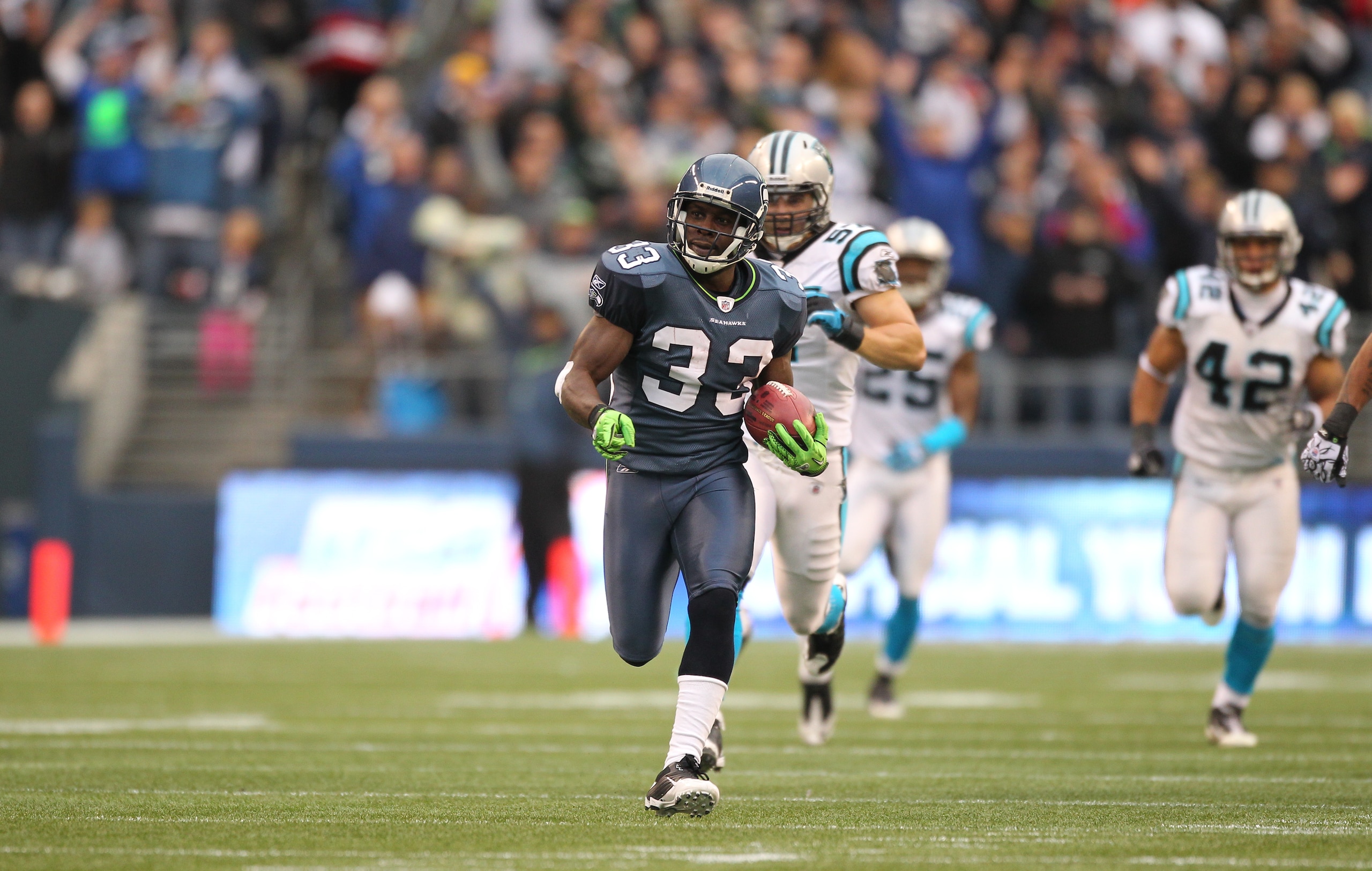 SEATTLE - DECEMBER 05: Running back Leon Washington #33 of the Seattle Seahawks returns a punt for 84 yards against the Carolina Panthers at Qwest Field on December 5, 2010 in Seattle, Washington. Washington was down at the 2 yard line on the play, and t SEATTLE - DECEMBER 05: Running back Leon Washington #33 of the Seattle Seahawks returns a punt for 84 yards against the Carolina Panthers at Qwest Field on December 5, 2010 in Seattle, Washington. Washington was down at the 2 yard line on the play, and t
