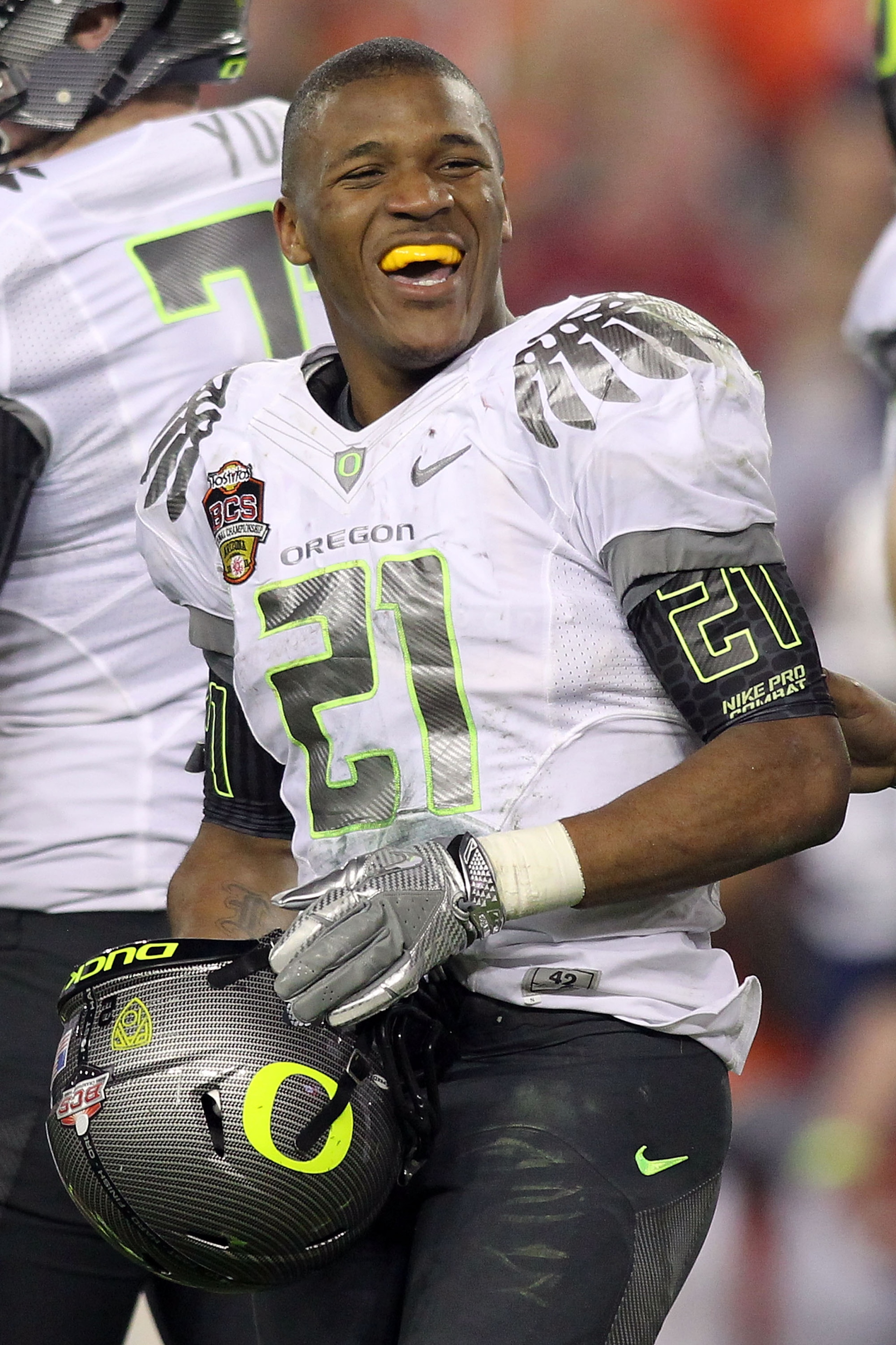 GLENDALE, AZ - JANUARY 10:  LaMichael James #21 of the Oregon Ducks smiles in the third quarter while taking on the Auburn Tigers during the Tostitos BCS National Championship Game at University of Phoenix Stadium on January 10, 2011 in Glendale, Arizona.