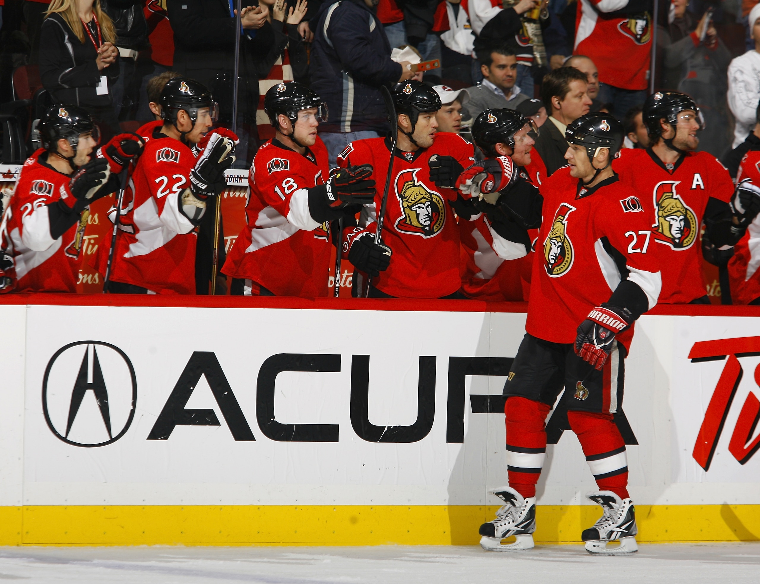 OTTAWA, ON - NOVEMBER 22:  Alex Kovalev #27 of the Ottawa Senators celebrates his goal and his 1000th NHL regular season point with his teammates on the bench during a game against the Los Angeles Kings at Scotiabank Place on November 22, 2010 in Ottawa,