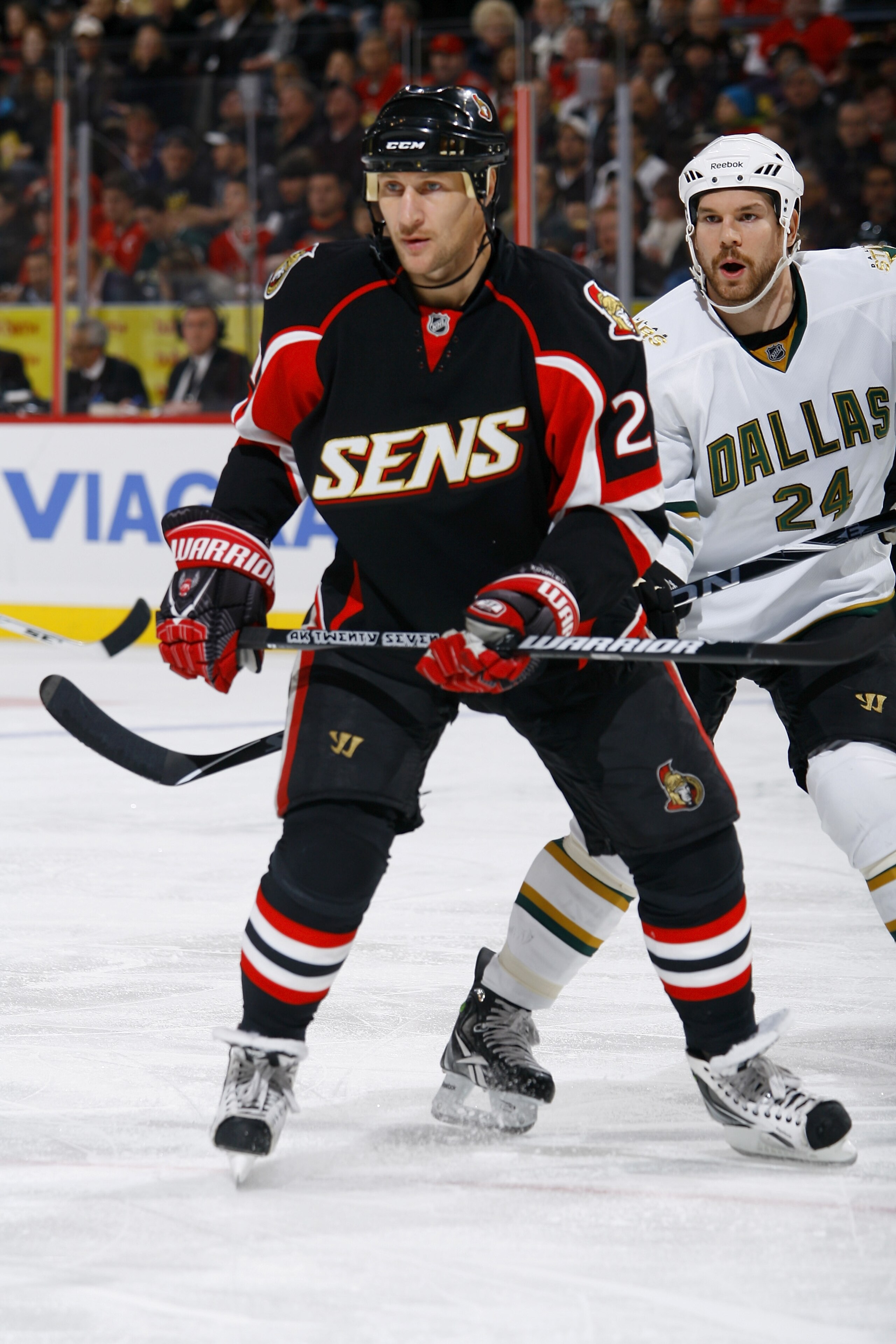 OTTAWA, ON - NOVEMBER 24: Alex Kovalev #27 of the Ottawa Senators follows the play in the corner while being closely watched by Brandon Segal #24 of the Dallas Stars in a game at Scotiabank Place on November 24, 2010 in Ottawa, Ontario, Canada. (Photo by