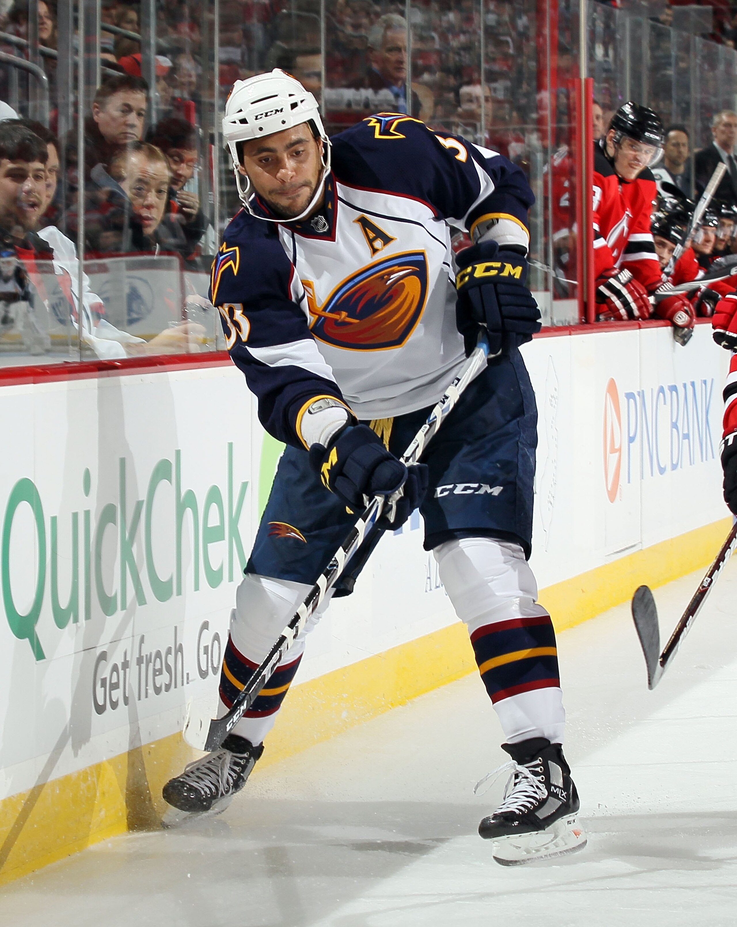NEWARK, NJ - DECEMBER 31:  Dustin Byfuglien #33 of the Atlanta Thrashers skates against the New Jersey Devils at the Prudential Center on December 31, 2010 in Newark, New Jersey. The Devils defeated the Thrashers 3-1.  (Photo by Jim McIsaac/Getty Images)