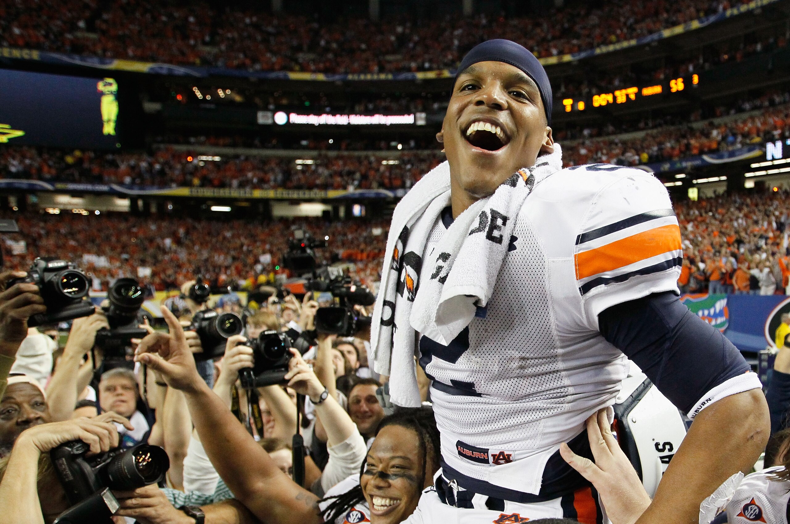 ATLANTA, GA - DECEMBER 04:  Quarterback Cam Newton #2 of the Auburn Tigers celebrates after their 56-17 win over the South Carolina Gamecocks during the 2010 SEC Championship at Georgia Dome on December 4, 2010 in Atlanta, Georgia.  (Photo by Kevin C. Cox