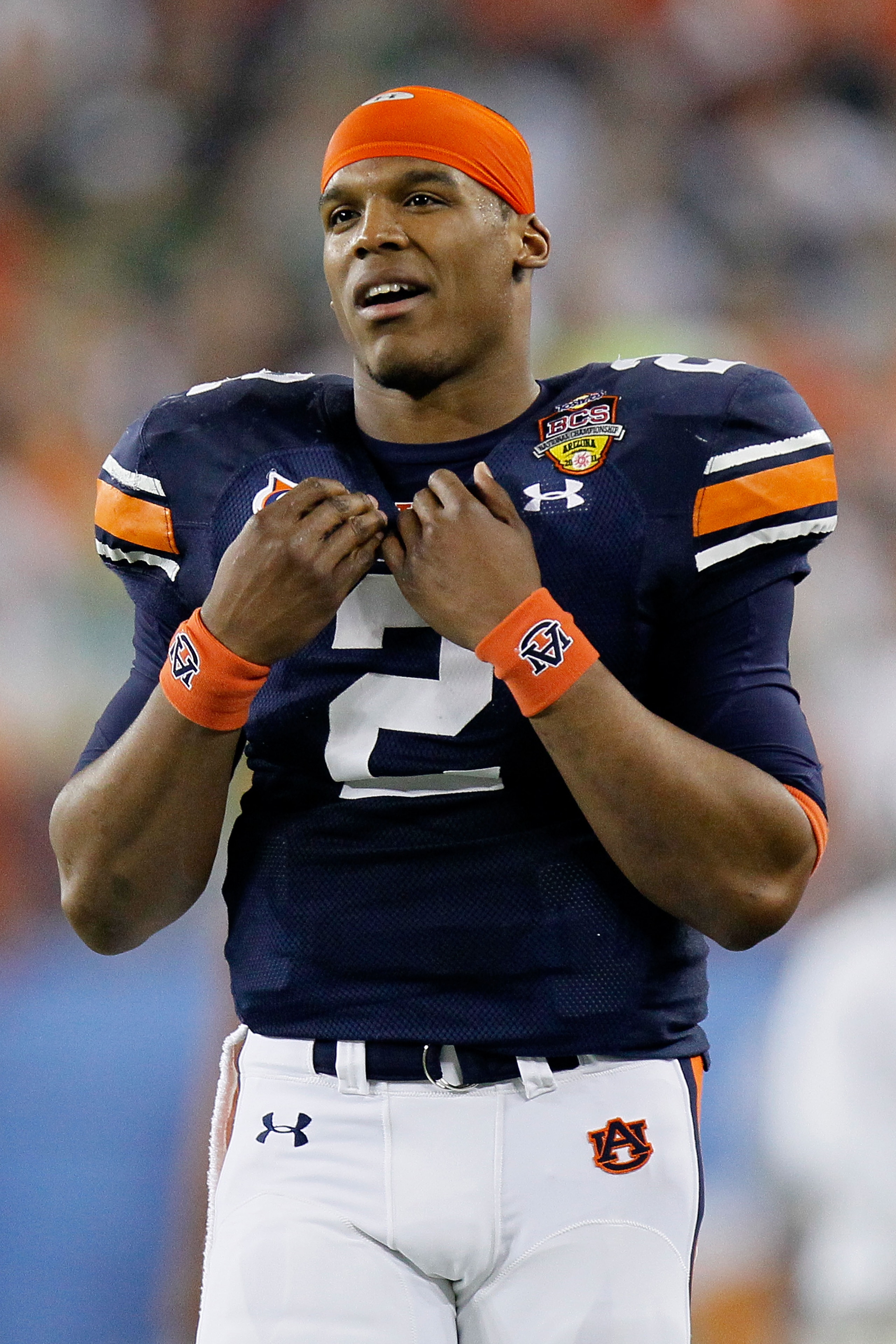 GLENDALE, AZ - JANUARY 10:  Quarterback Cameron Newton #2 of the Auburn Tigers looks on from the sideline in the first quarter against the Oregon Ducks during the Tostitos BCS National Championship Game at University of Phoenix Stadium on January 10, 2011