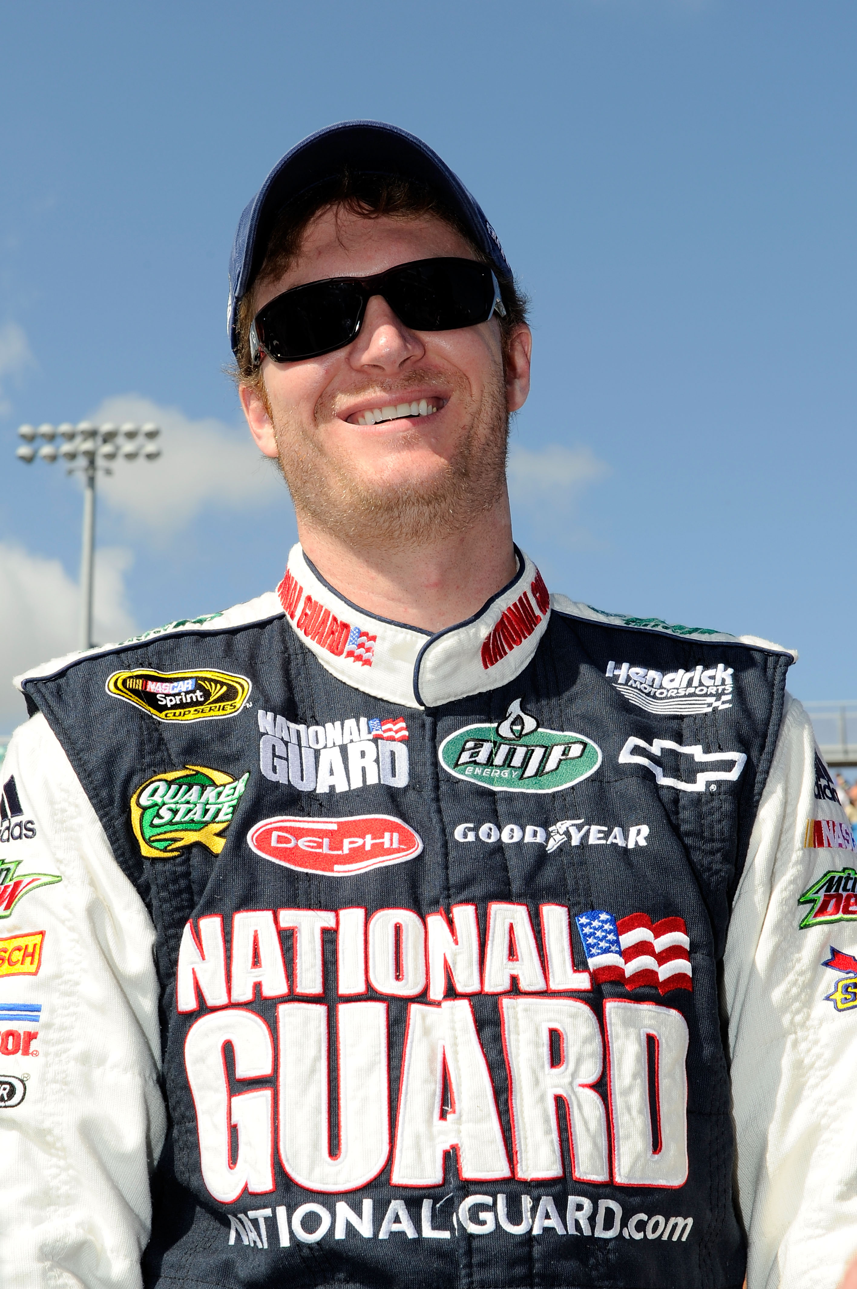 HOMESTEAD, FL - NOVEMBER 21:  Dale Earnhardt Jr., driver of the #88 National Guard/AMP Energy Chevrolet, stands on pit road prior to the NASCAR Sprint Cup Series Ford 400 at Homestead-Miami Speedway on November 21, 2010 in Homestead, Florida.  (Photo by J