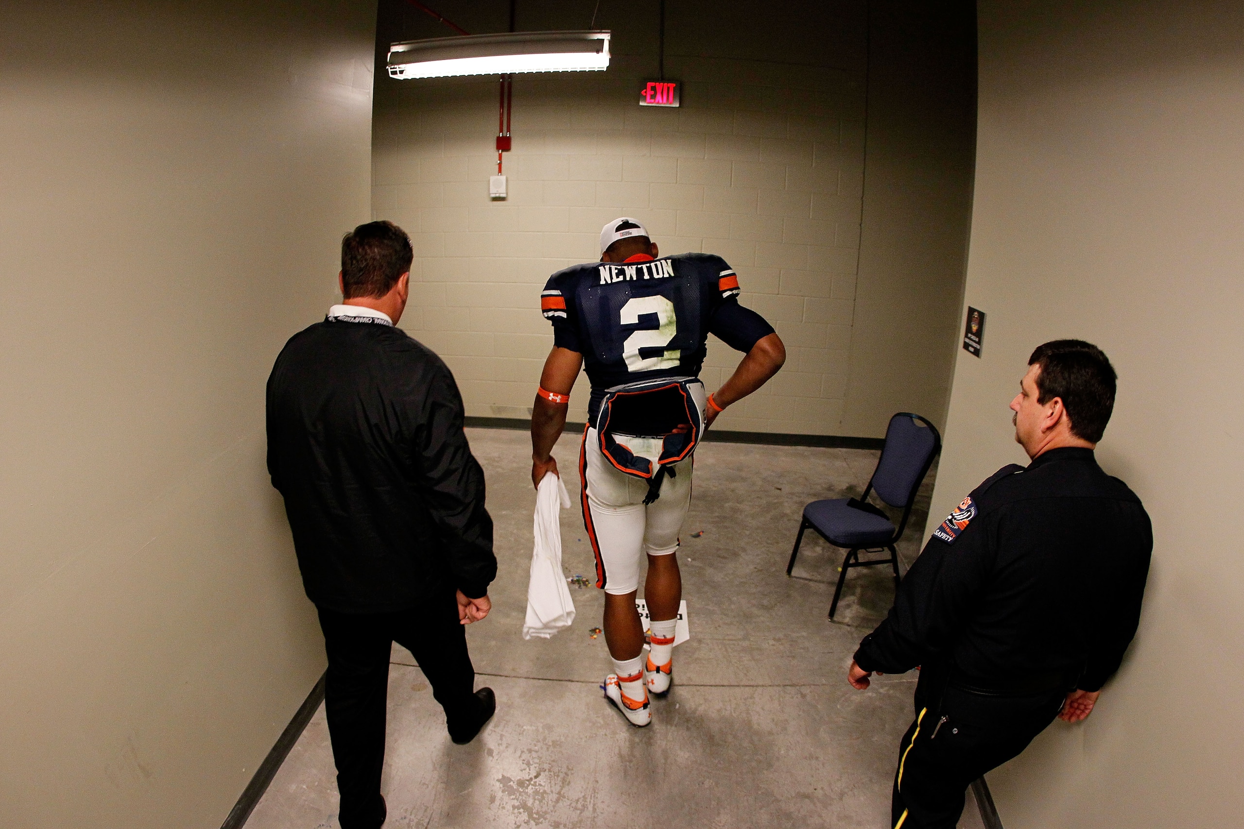 GLENDALE, AZ - JANUARY 10:  Quarterback Cameron Newton #2 of the Auburn Tigers walks through the tunnel towards the locker room after the Tigers 22-19 victory against the Oregon Ducks in the Tostitos BCS National Championship Game at University of Phoenix