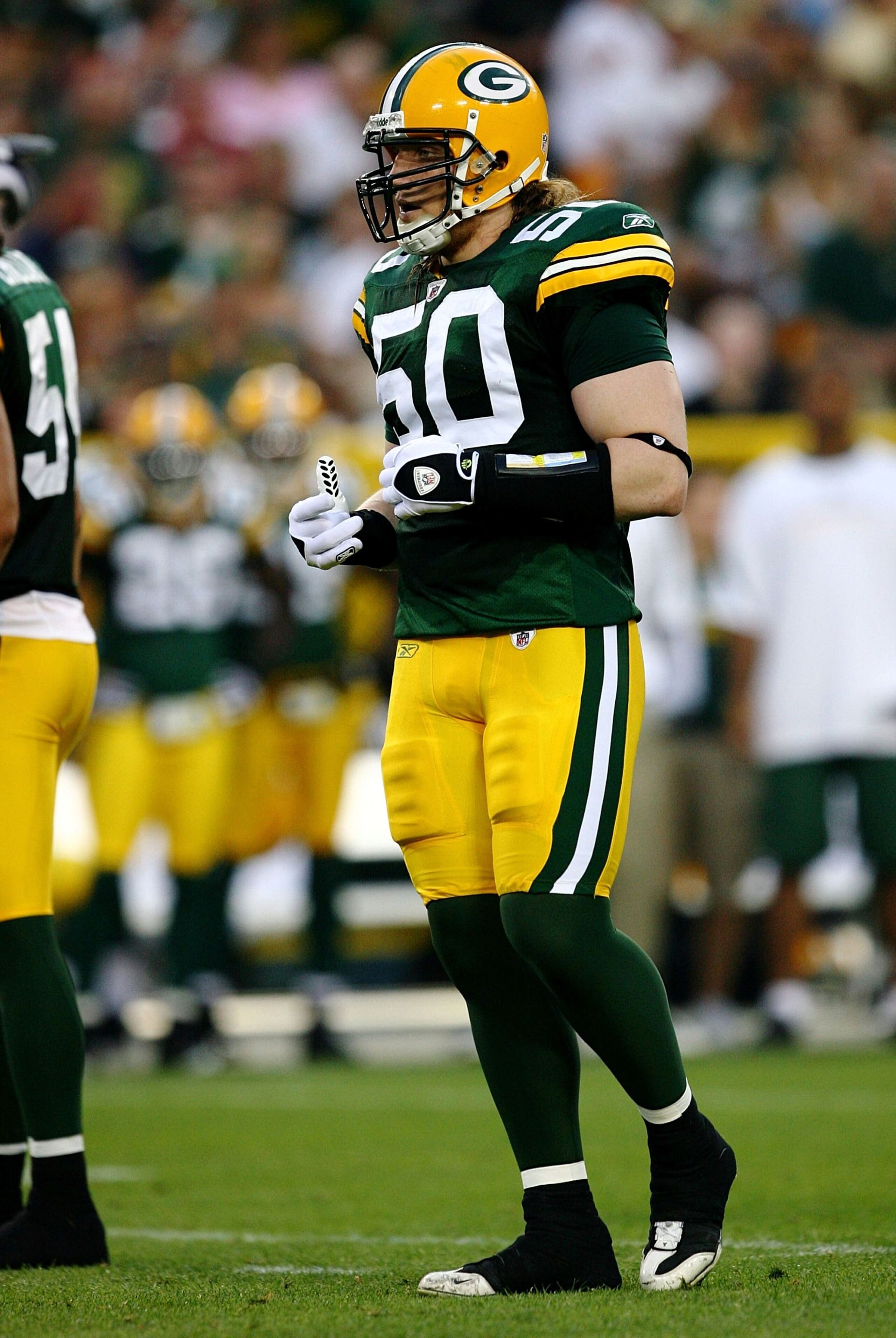 GREEN BAY, WI - AUGUST 15:  Linebacker A.J. Hawk #50 of the Green Bay Packers looks on against the Cleveland Browns during the preseason game at Lambeau Field on August 15, 2009 in Green Bay, Wisconsin.  (Photo by Jonathan Daniel/Getty Images)