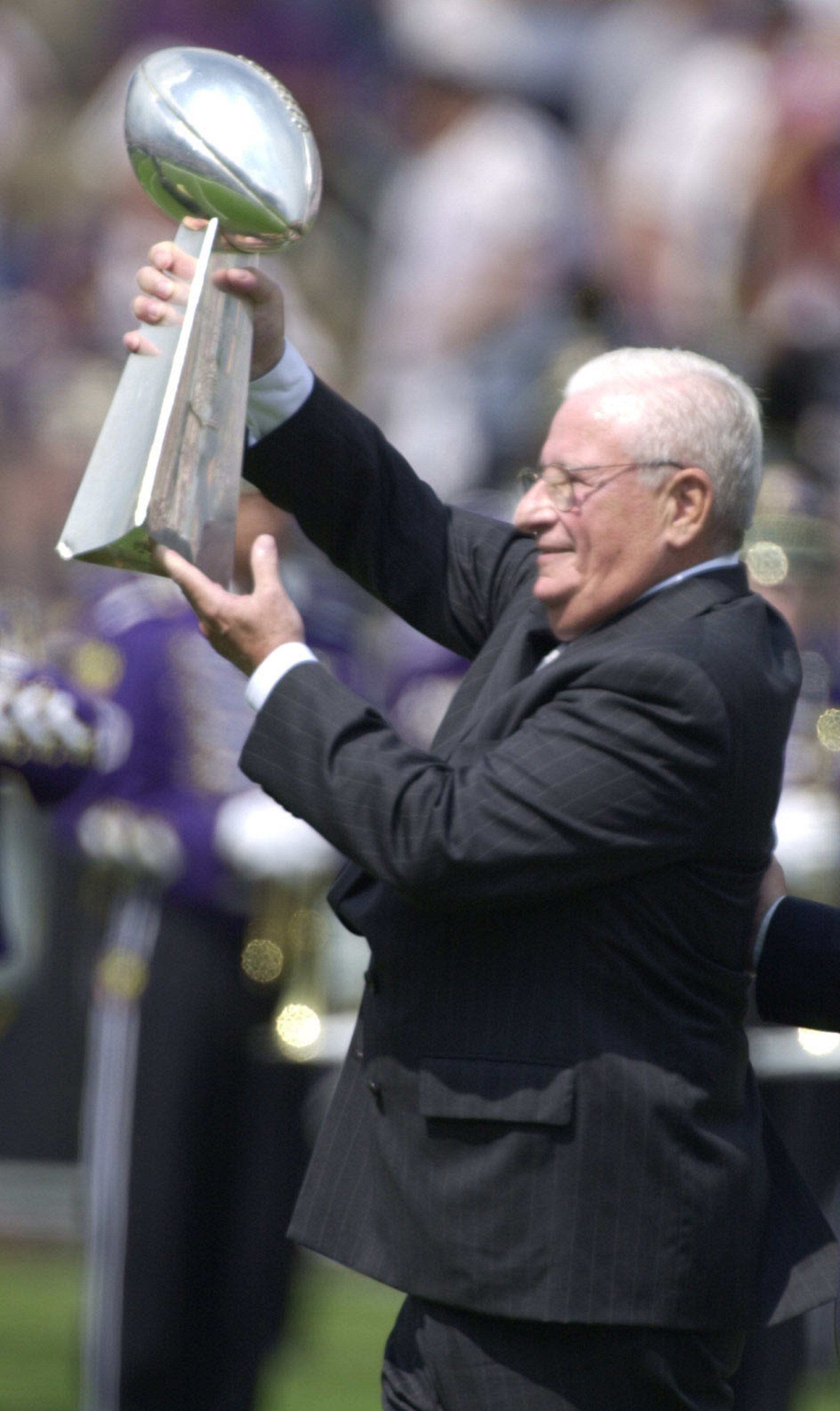 9 Sep 2001: Art Modell, owner of the Baltimore Ravens presents the superbowl trophy to the crowd during pre-game festivities at the game against the Chicago Bears at PSINet Stadium in Baltimore, Maryland. The Ravens won 17-6. DIGITAL IMAGE. Mandatory Cre 9 Sep 2001: Art Modell, owner of the Baltimore Ravens presents the superbowl trophy to the crowd during pre-game festivities at the game against the Chicago Bears at PSINet Stadium in Baltimore, Maryland. The Ravens won 17-6. DIGITAL IMAGE. Mandatory Cre